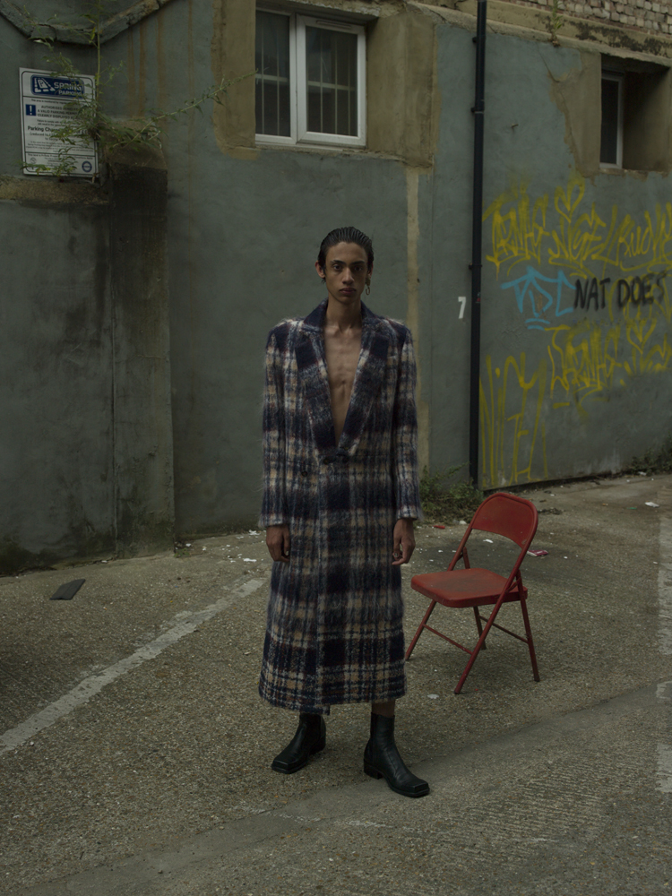 Coat by J.JS LEE, earring by SLIM BARRETT, boots by ROCKER