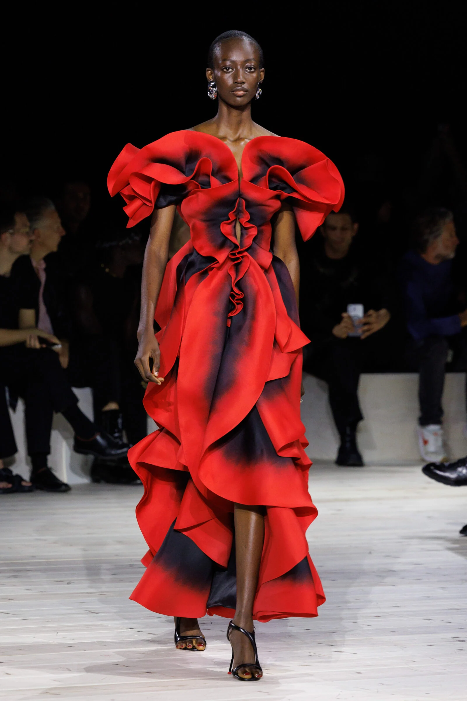 An evocative piece from "Anatomy II" captures the essence of Sarah Burton's tenure at Alexander McQueen, melding edginess with elegance. An evocative piece from "Anatomy II" captures the essence of Sarah Burton