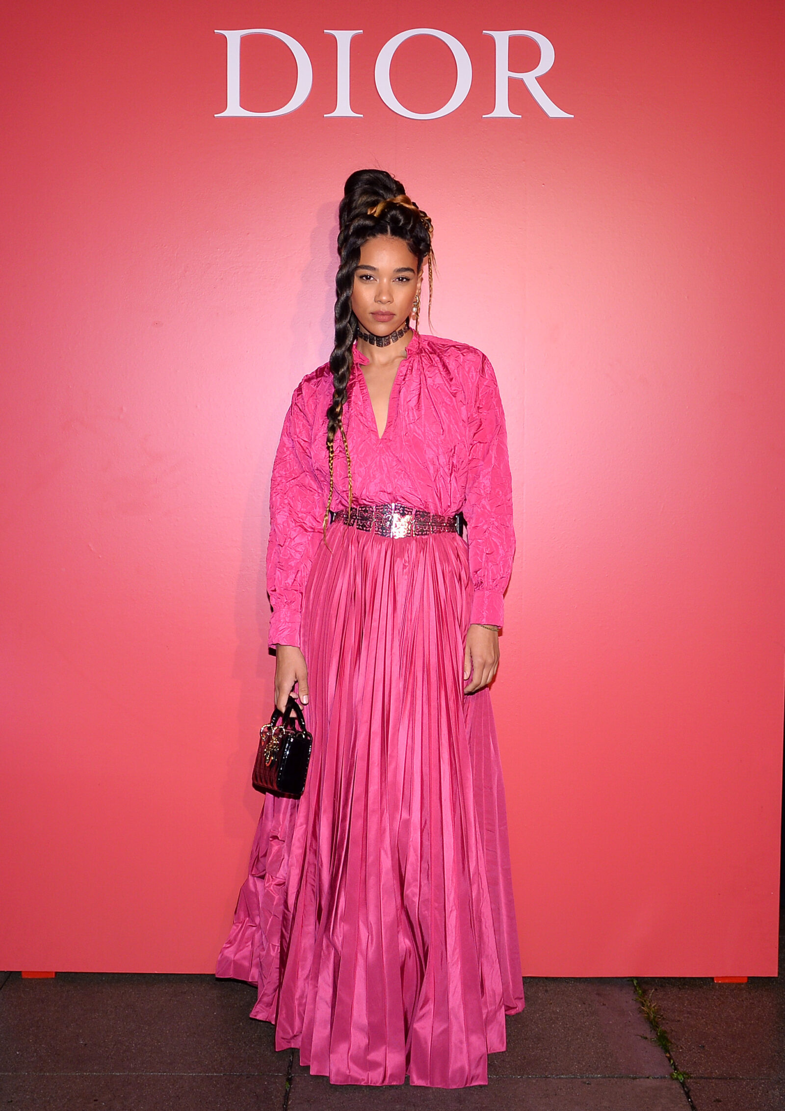 Alexandra Shipp makes a striking statement in Dior Cruise 2024, showcasing the joyous spirit of the new Rouge Dior collection.