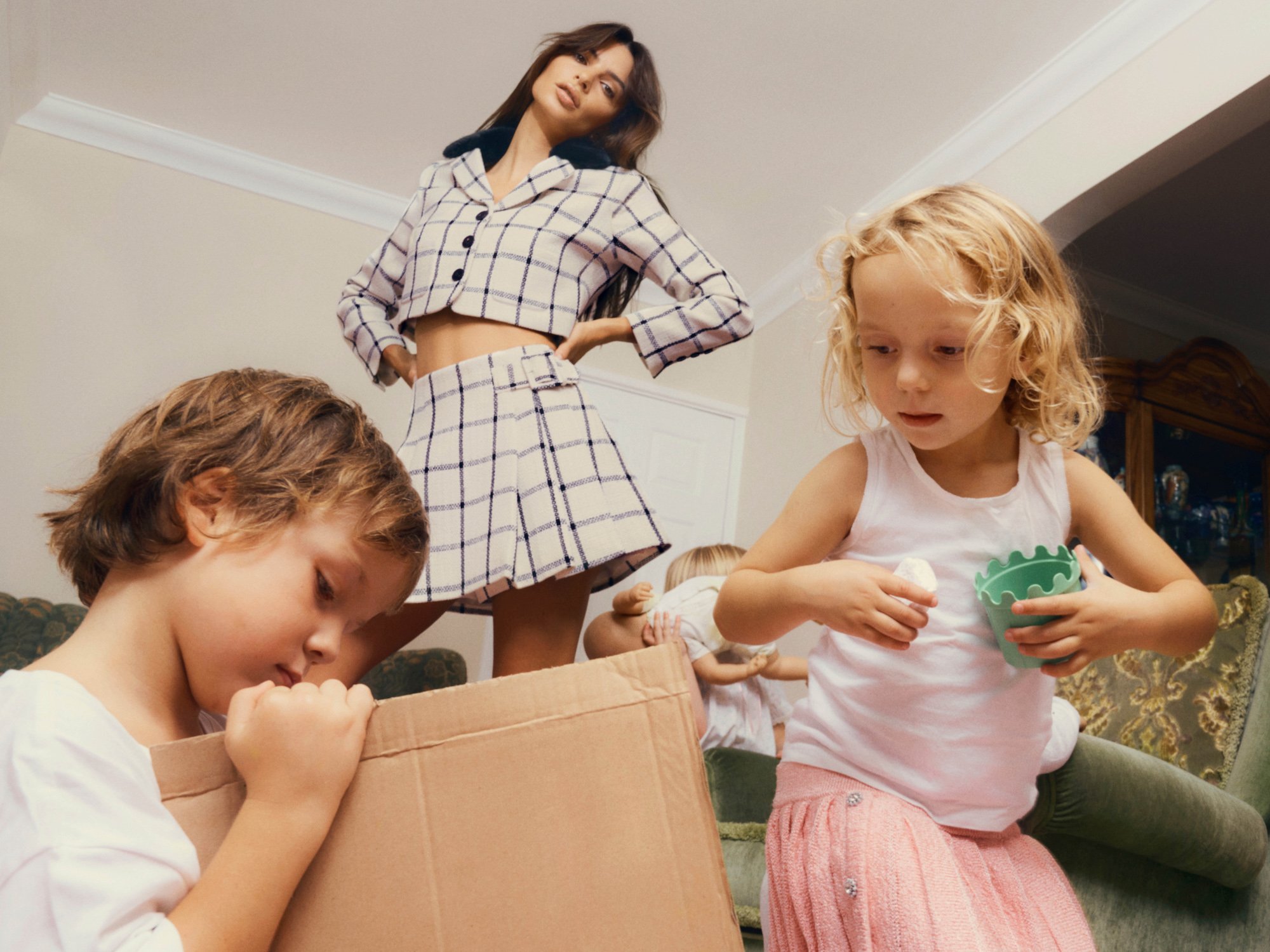 Emily Ratajkowski: Blending High Fashion with Playtime, Celebrating the Joys of Modern Motherhood.