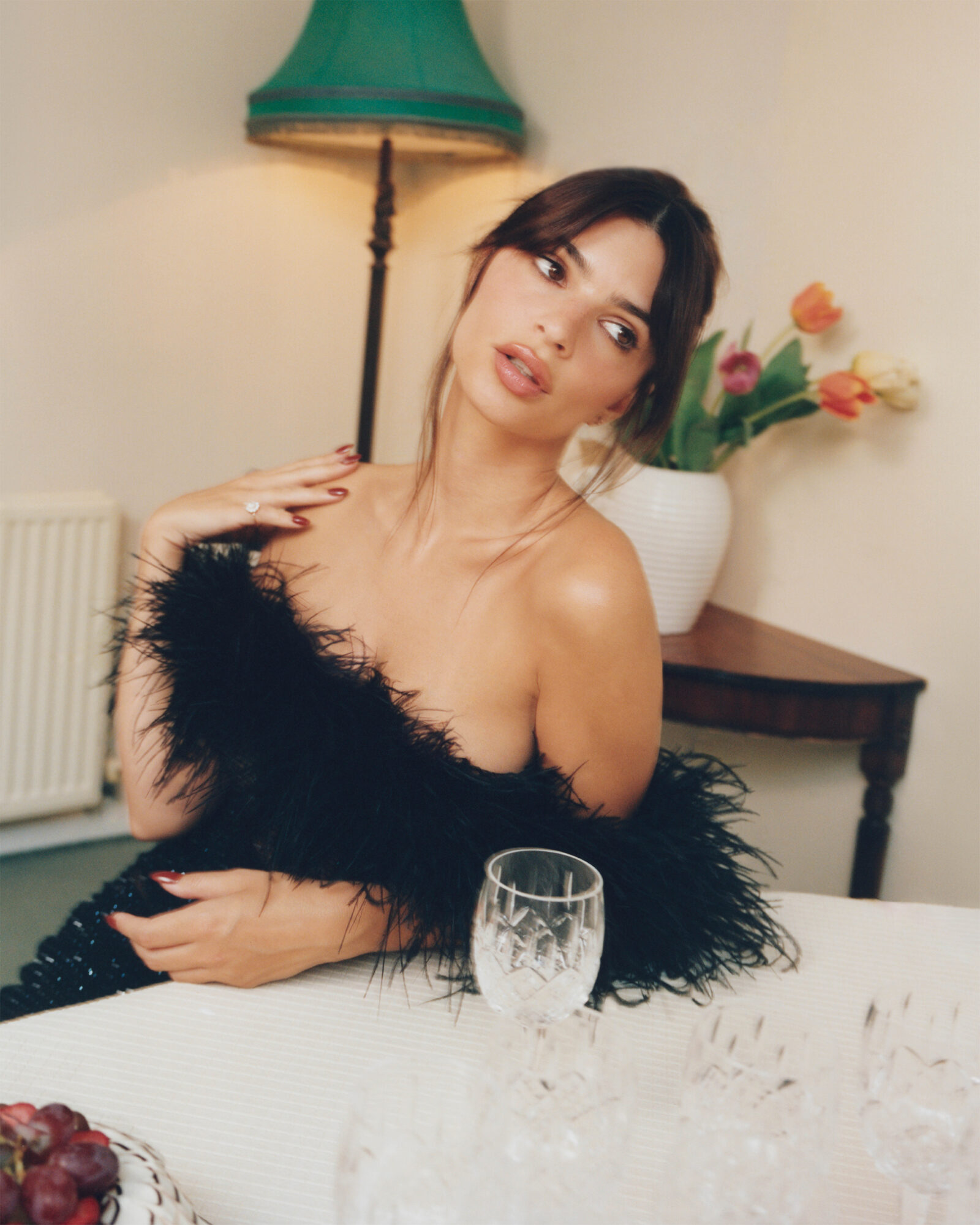 Transcending the boundaries between the domestic and the glamorous, Emily Ratajkowski showcases the versatility of self-portrait's latest collection with every poised gesture.