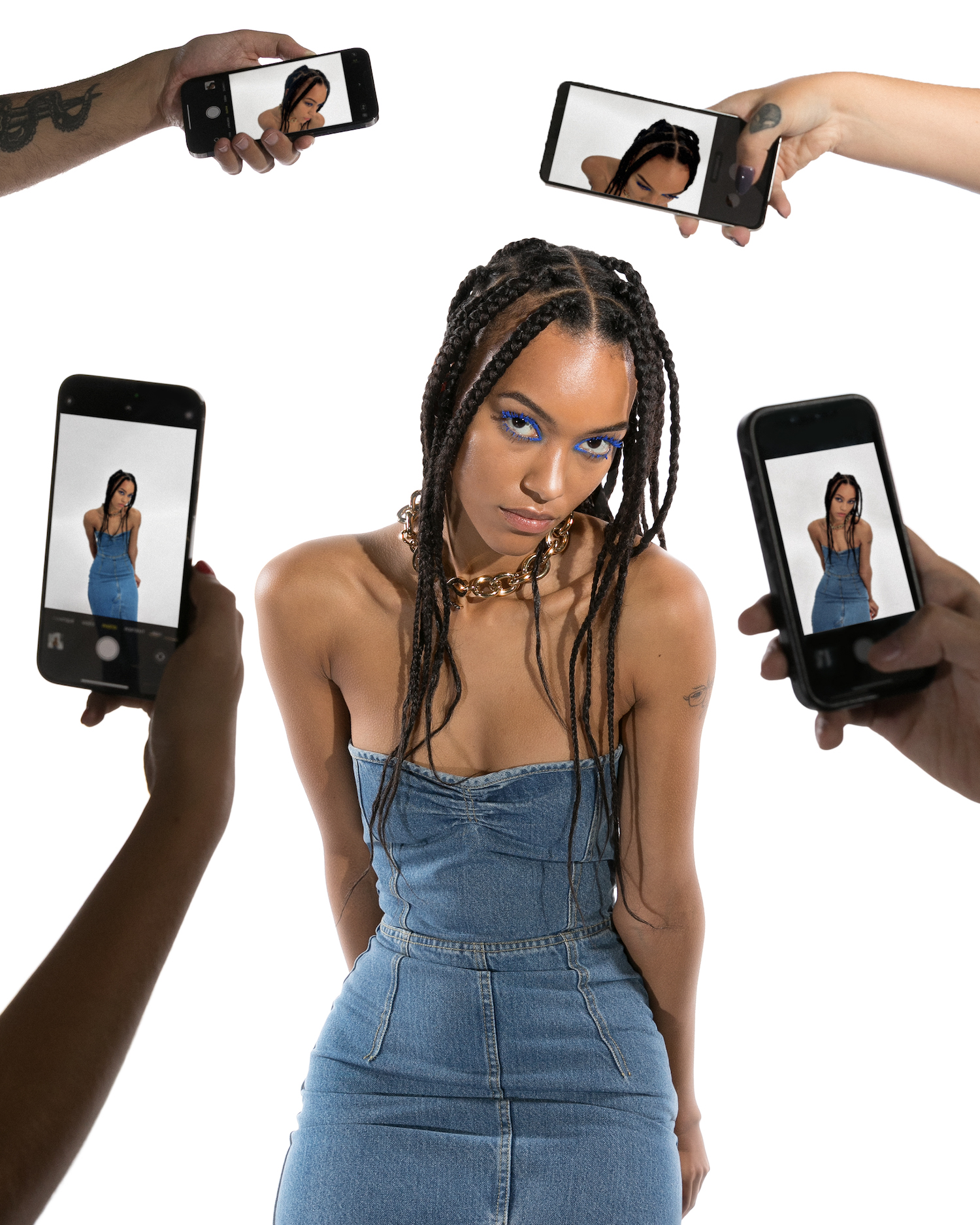 Captured in AZ Factory's DENIM EDITION SERIES 1, a model dons a sleek denim ensemble, drawing the attention of multiple onlookers and their cameras, embodying the collection's blend of traditional craftsmanship and modern allure. Captured in AZ Factory