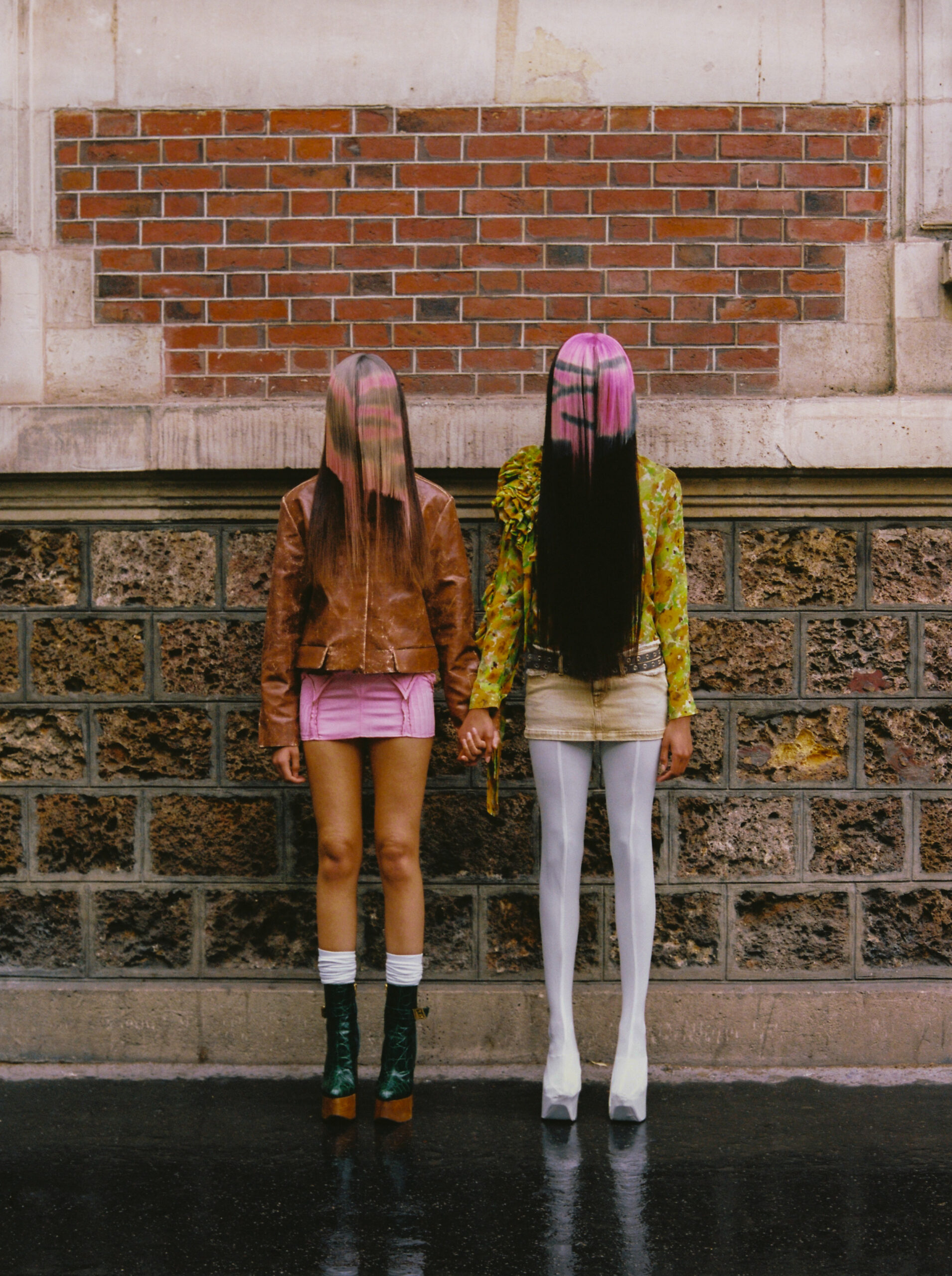 L-R: AMINA wears jacket by MOONYOUNGHEE, skirt by NEW RELATION, socks by FALKE, boots by BALMAIN. ELODIE wears shirt by DRIES VAN NOTEN, skirt and belt by DIESEL, boots by MAITREPIERRE AMINA wears jacket by MOONYOUNGHEE, skirt by NEW RELATION, socks by FALKE, boots by BALMAIN. ELODIE wears shirt by DRIES VAN NOTEN, skirt and belt by DIESEL, boots by MAITREPIERRE