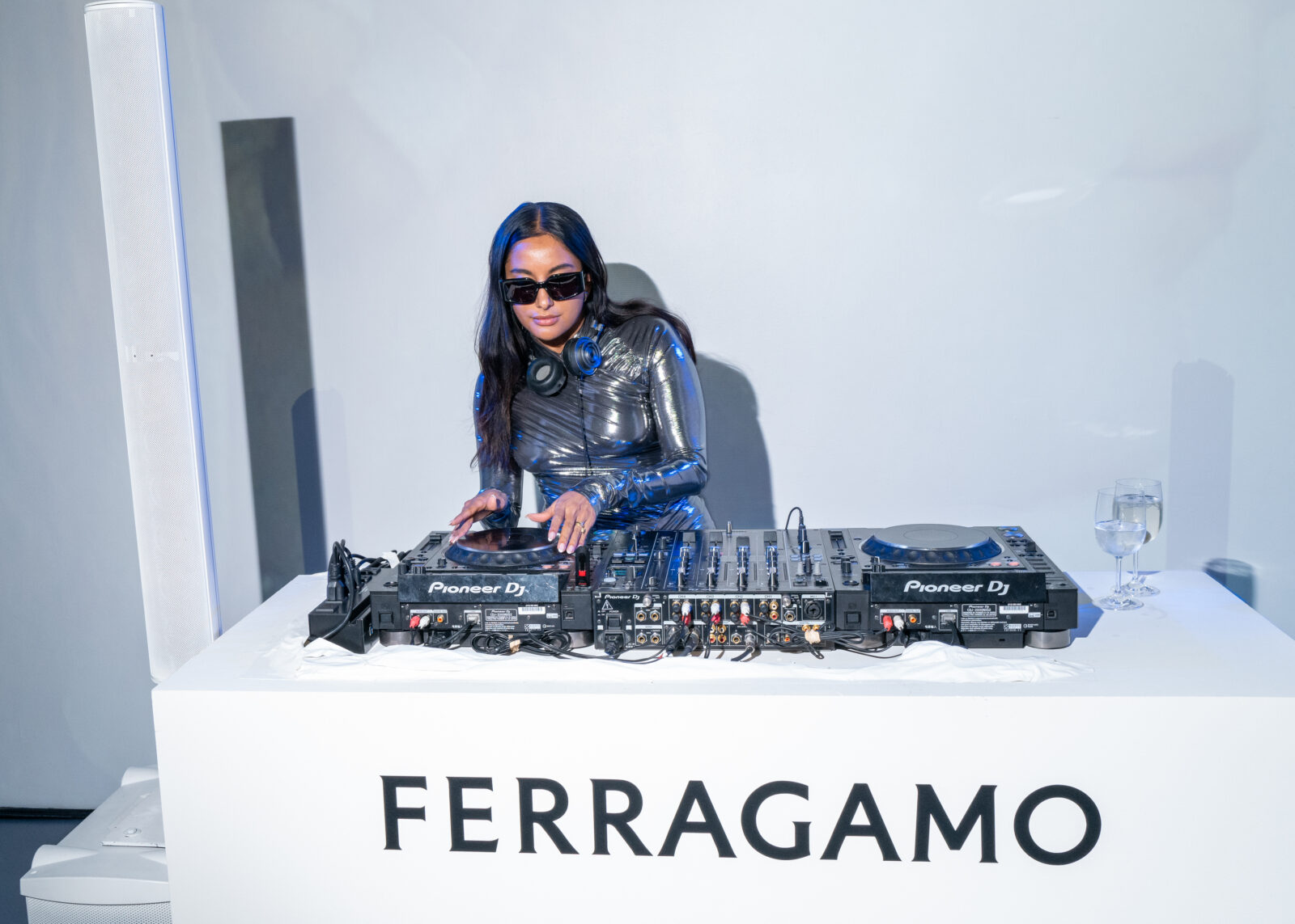 DJ Amrit Tietz spinning tracks at the Ferragamo Fall-Winter 2023 event, effortlessly blending the world of fashion with rhythm and beats. Photo courtesy of Ferragamo.
