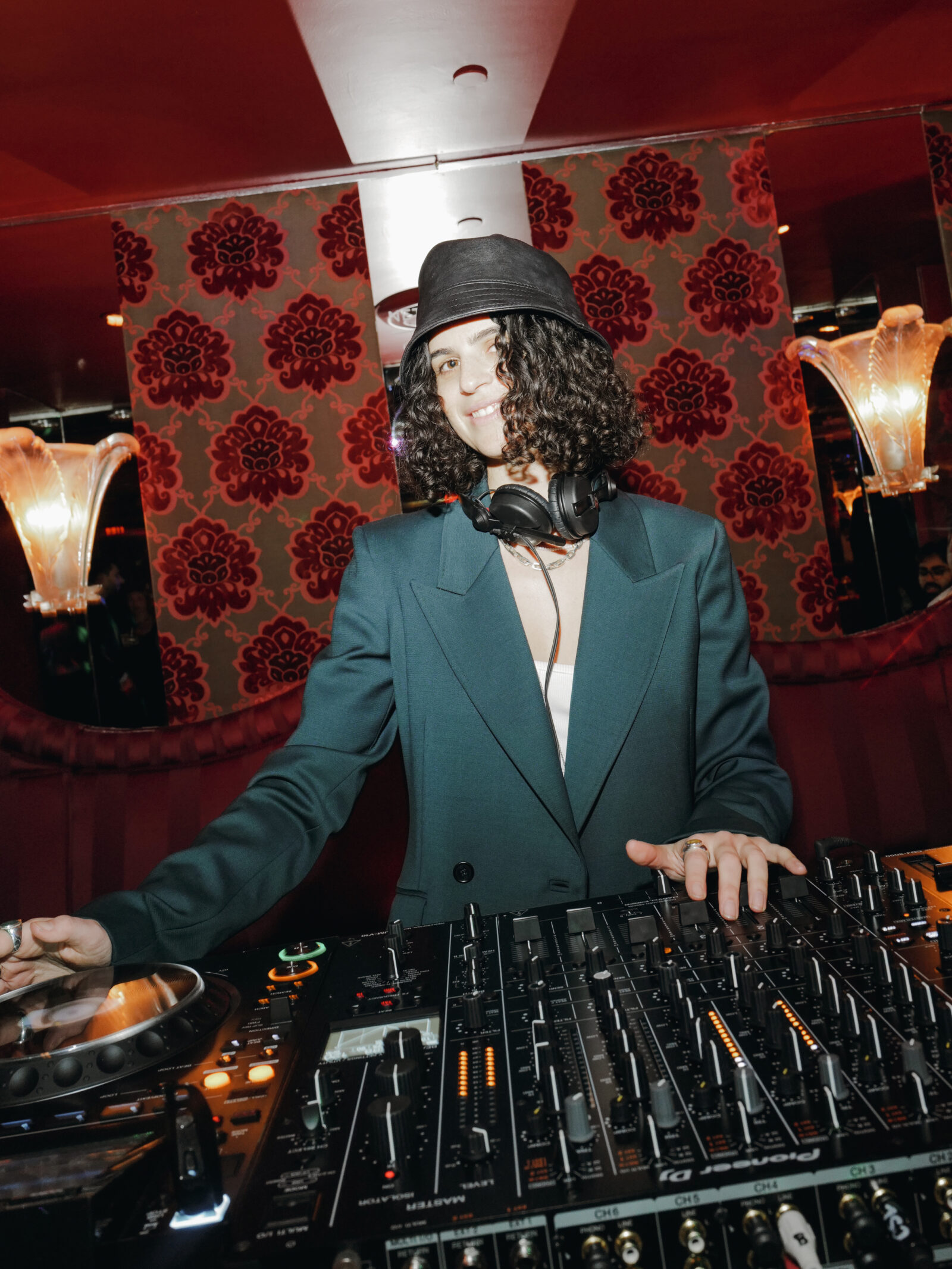 DJ Carlita mixes vibrant beats at The Doubles Club, adding an electrifying soundtrack to the NET-A-PORTER and Gabriela Hearst exclusive collection launch. Images courtesy of BFA. DJ Carlita mixes vibrant beats at The Doubles Club, adding an electrifying soundtrack to the NET-A-PORTER and Gabriela Hearst exclusive collection launch.