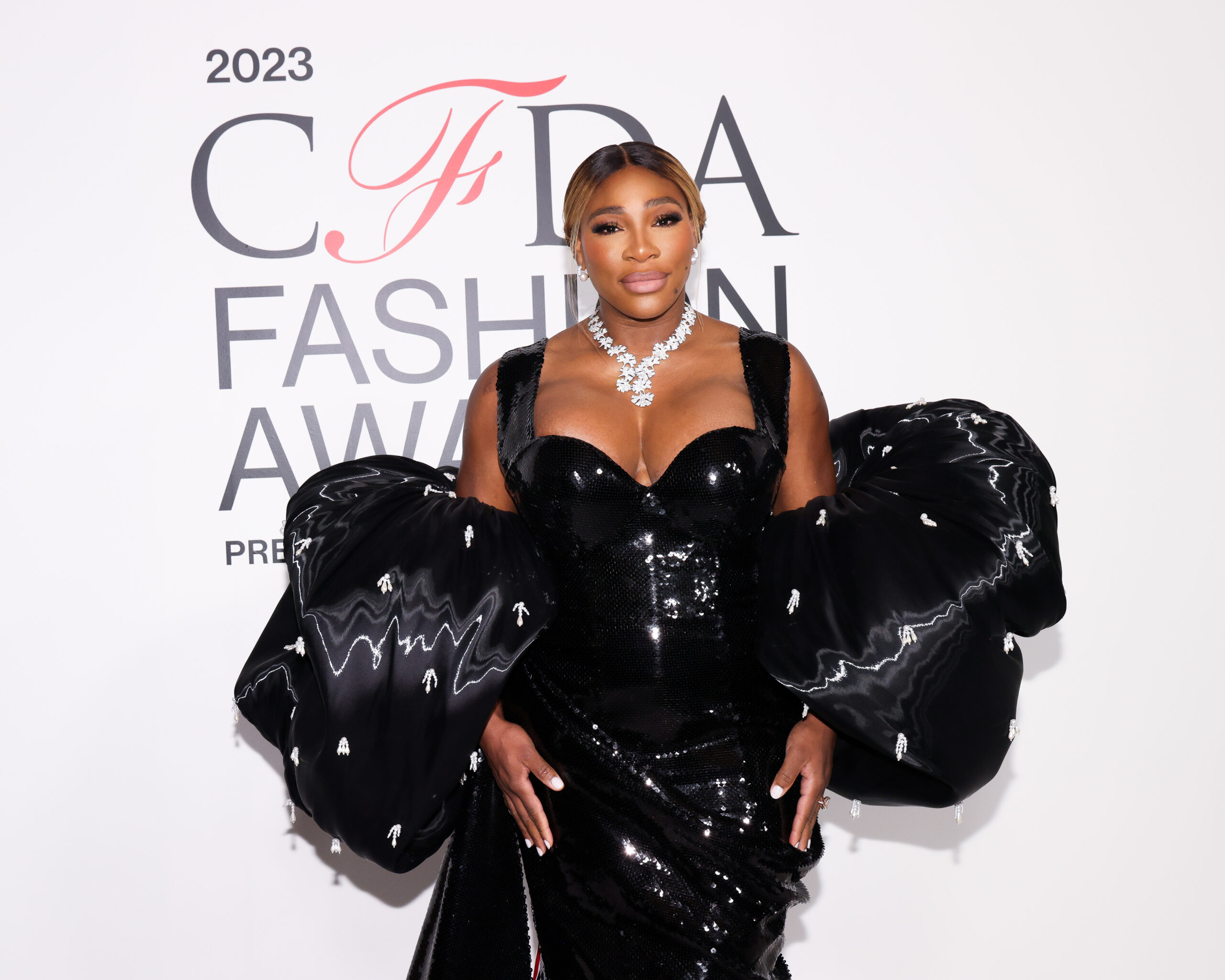Serena Williams attends the CFDA Fashion Awards, named Fashion Icon by Kim Kardashian, in a striking Thom Browne creation, embodying the elegance and creativity celebrated at this prestigious event.