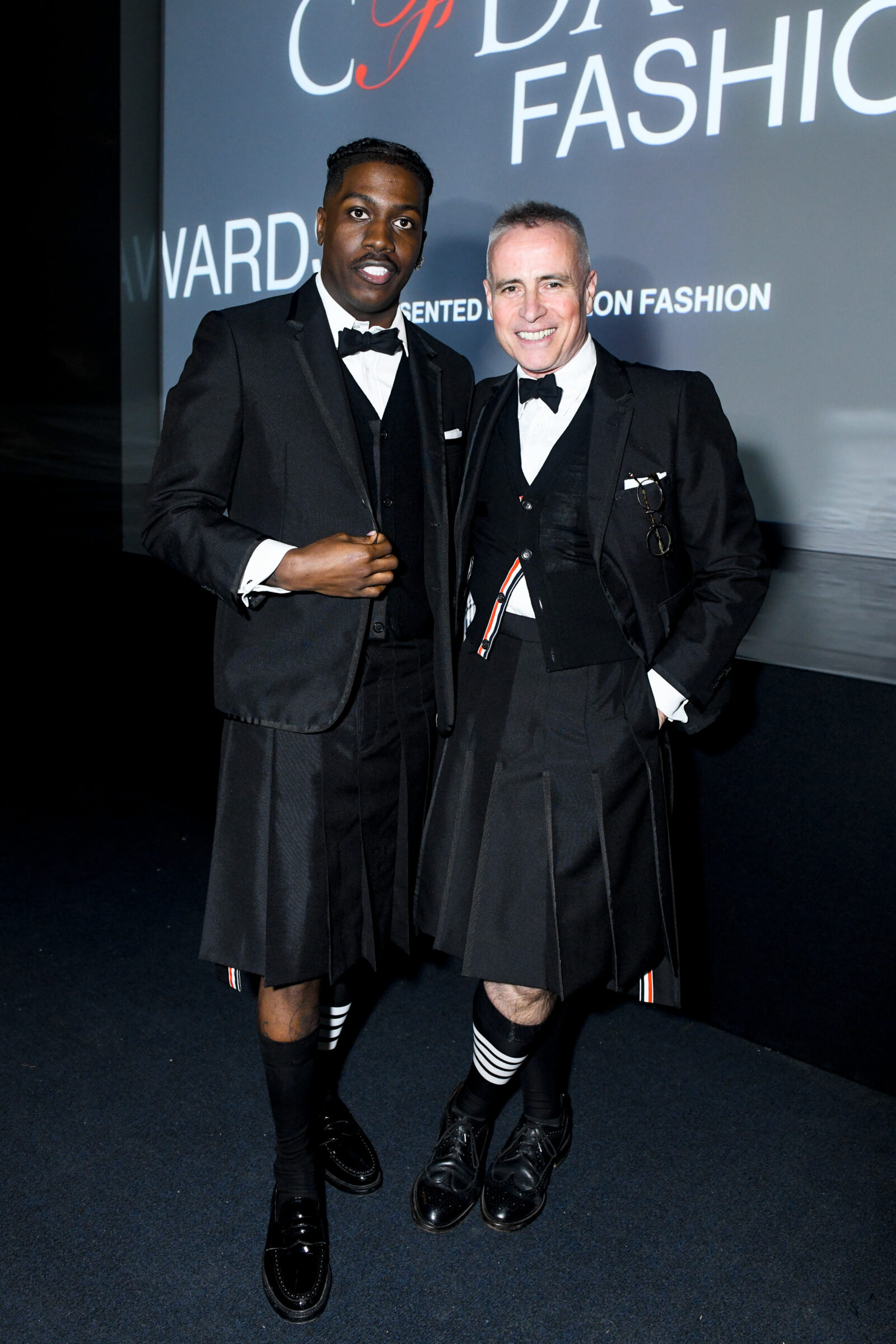 Fashion icons unite: Rapper Lil Yachty and designer Thom Browne showcase unique styles at the CFDA 2023 Awards. Fashion icons unite: Rapper Lil Yachty and designer Thom Browne showcase unique styles at the CFDA 2023 Awards.