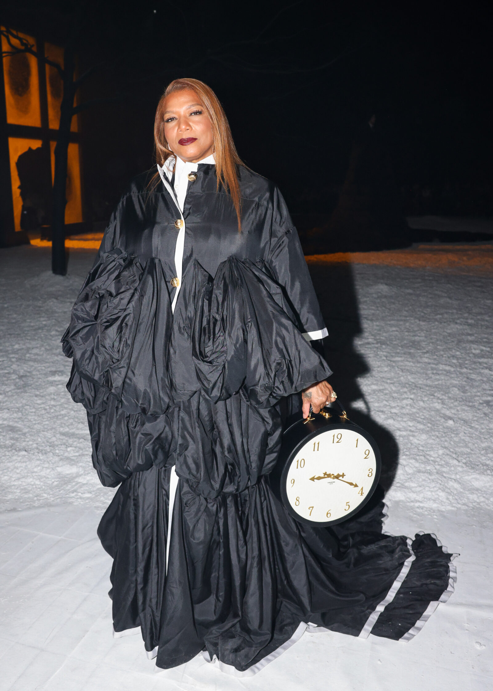 Queen Latifah attends the Thom Browne FW24 show wearing Thom Browne in New York. (Image courtesy of Thom Browne)