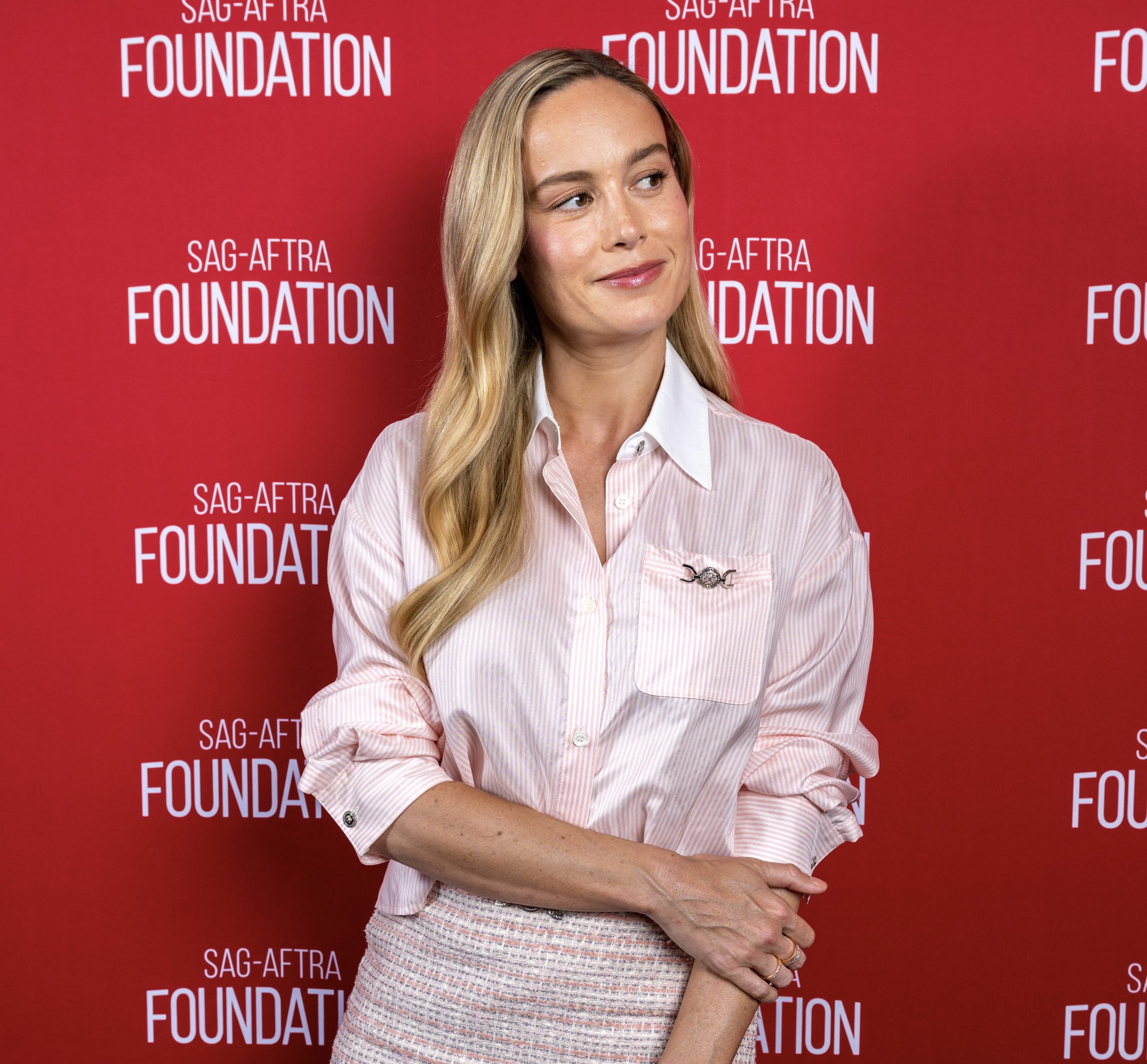 Brie Larson Dazzles in Versace: A Lesson in High-Fashion Chemistry