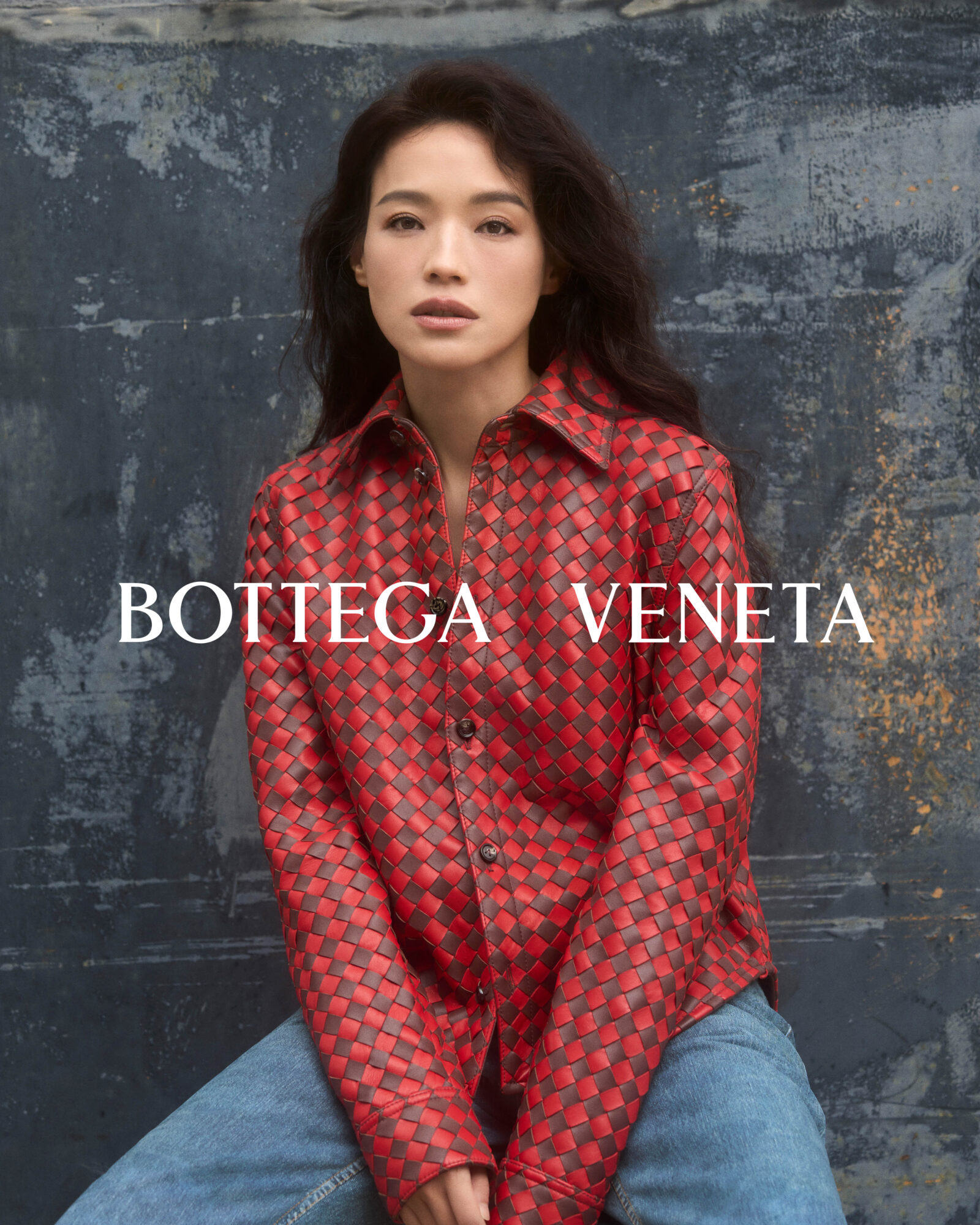 Shu Qi exudes effortless elegance in a vibrant red Bottega Veneta look, showcasing the brand's signature craftsmanship. Shu Qi exudes effortless elegance in a vibrant red Bottega Veneta look, showcasing the brand