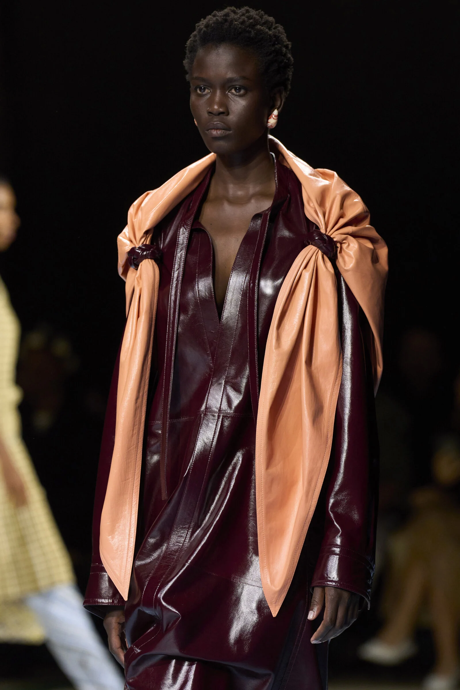 Bottega Veneta's ensemble weaves a visual story of freedom, echoing the vibrant themes of "The Adventures of Tom Sawyer."