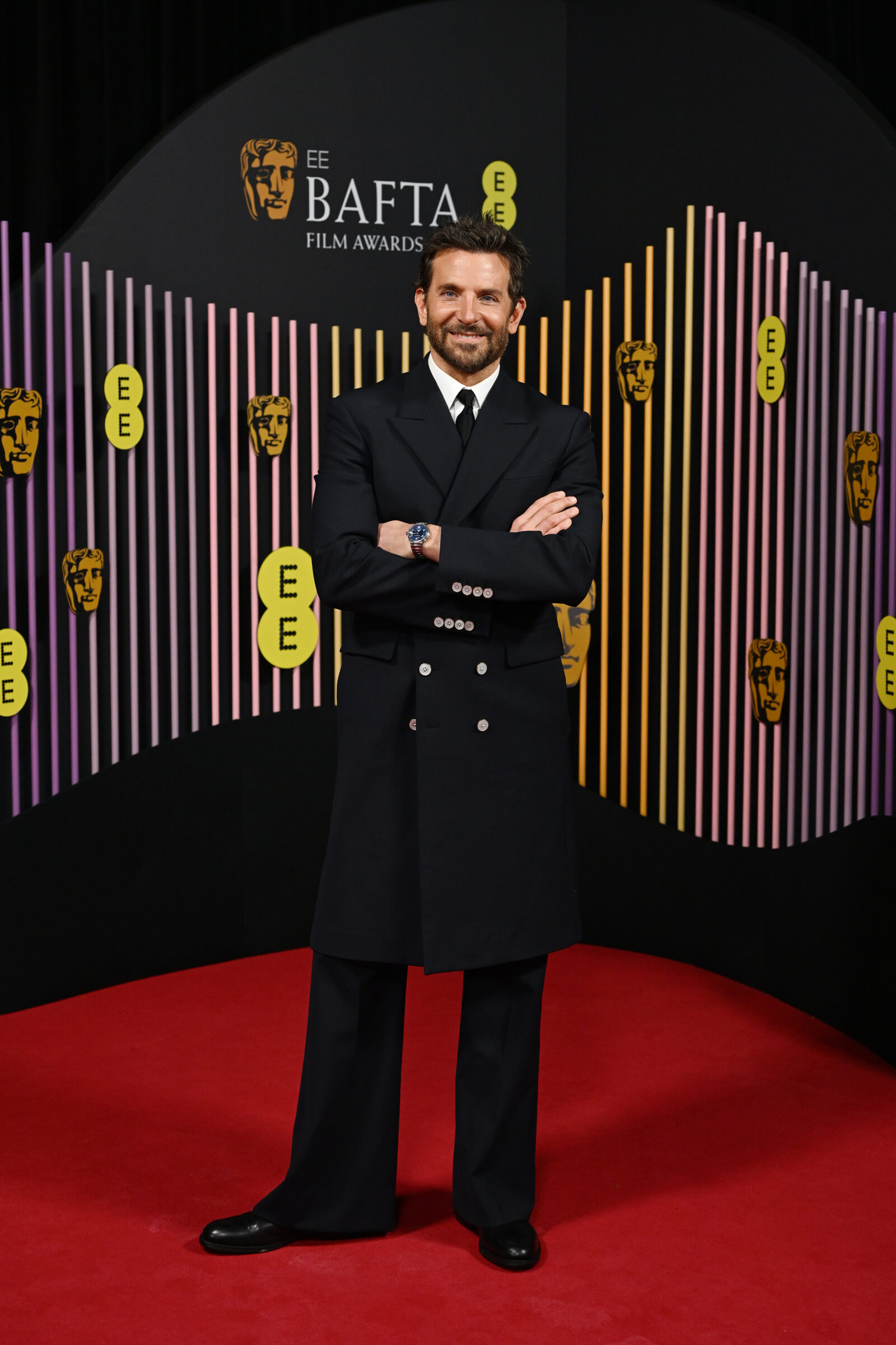 At the BAFTA Film Awards 2024 in London, Bradley Cooper was captured, where his Louis Vuitton Tambour watch is prominently featured, adding a touch of sophistication to his ensemble. (Photo by Kate Green/BAFTA/Getty Images for BAFTA)