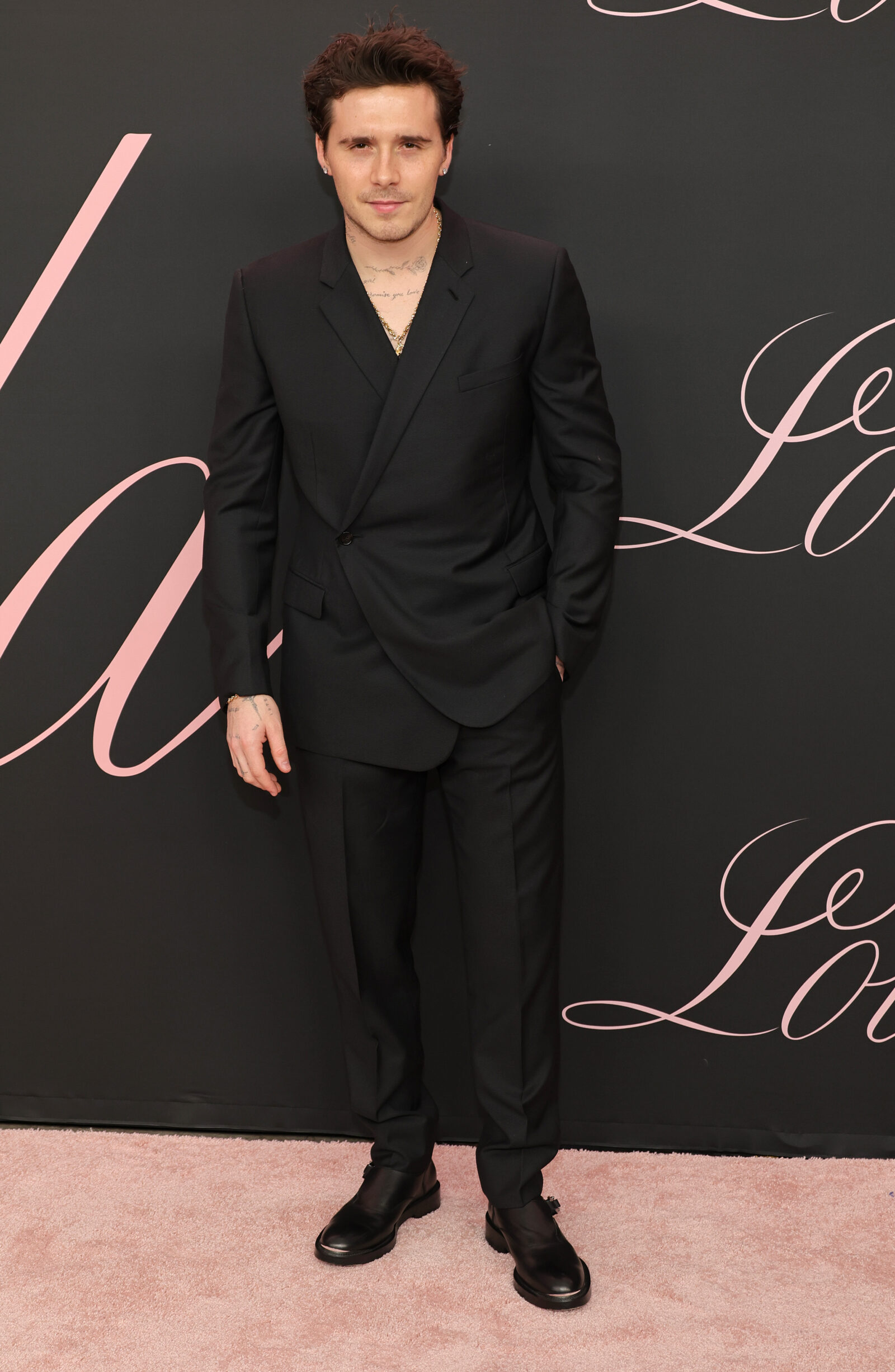 LOS ANGELES, CA - FEBRUARY 03: Adorned in Dior, Brooklyn Beckham makes a stylish appearance at the "Lola" premiere, Regency Bruin Theatre, Los Angeles, CA - February 3, 2024. (Photo by Kayla Oaddams/WireImage)