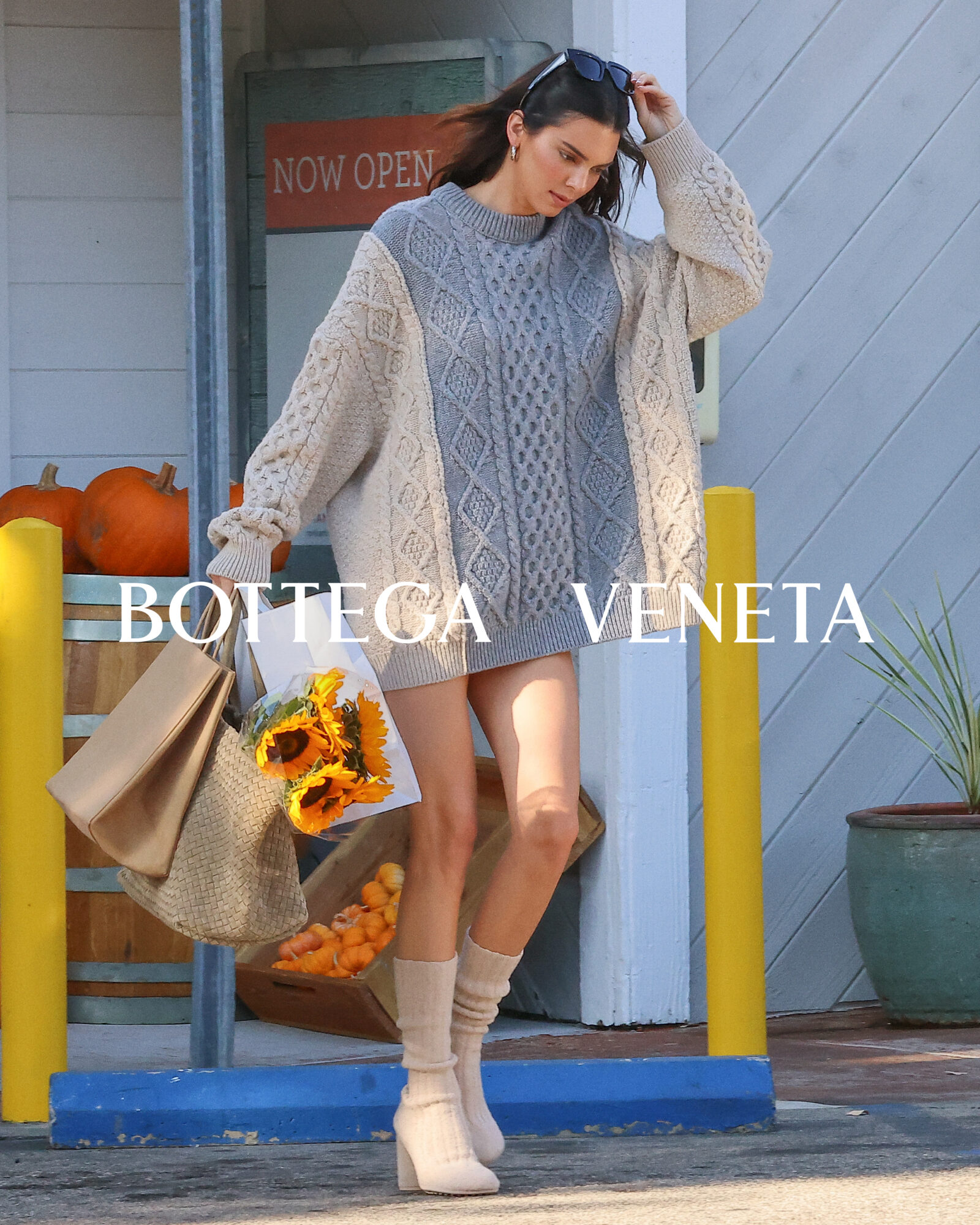 Kendall Jenner, epitomizing casual elegance, steps out in a Bottega Veneta chunky knit, merging comfort with high-end style.