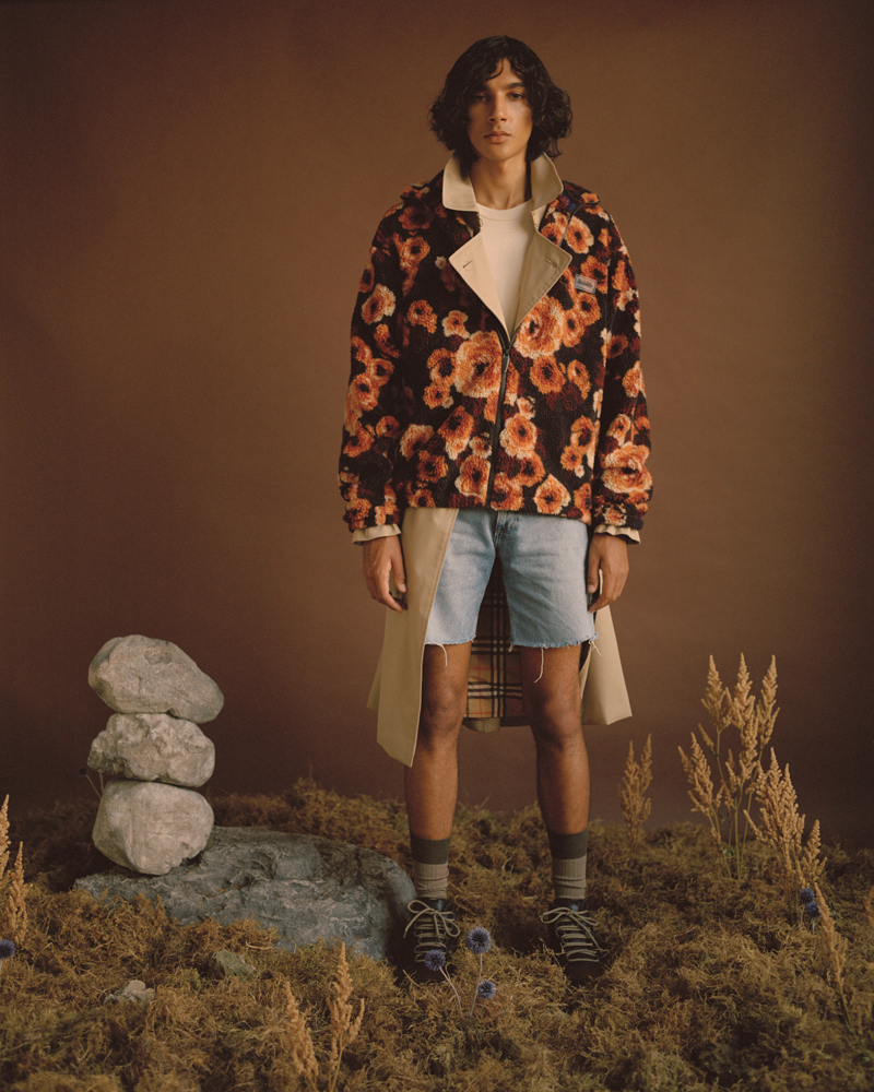jacket by NAPA BY MARTINE ROSE, coat by BURBERRY, T-shirt by AMERICAN APPAREL, shorts stylist’s own socks by PANTHERELLA, boots by CAMPER