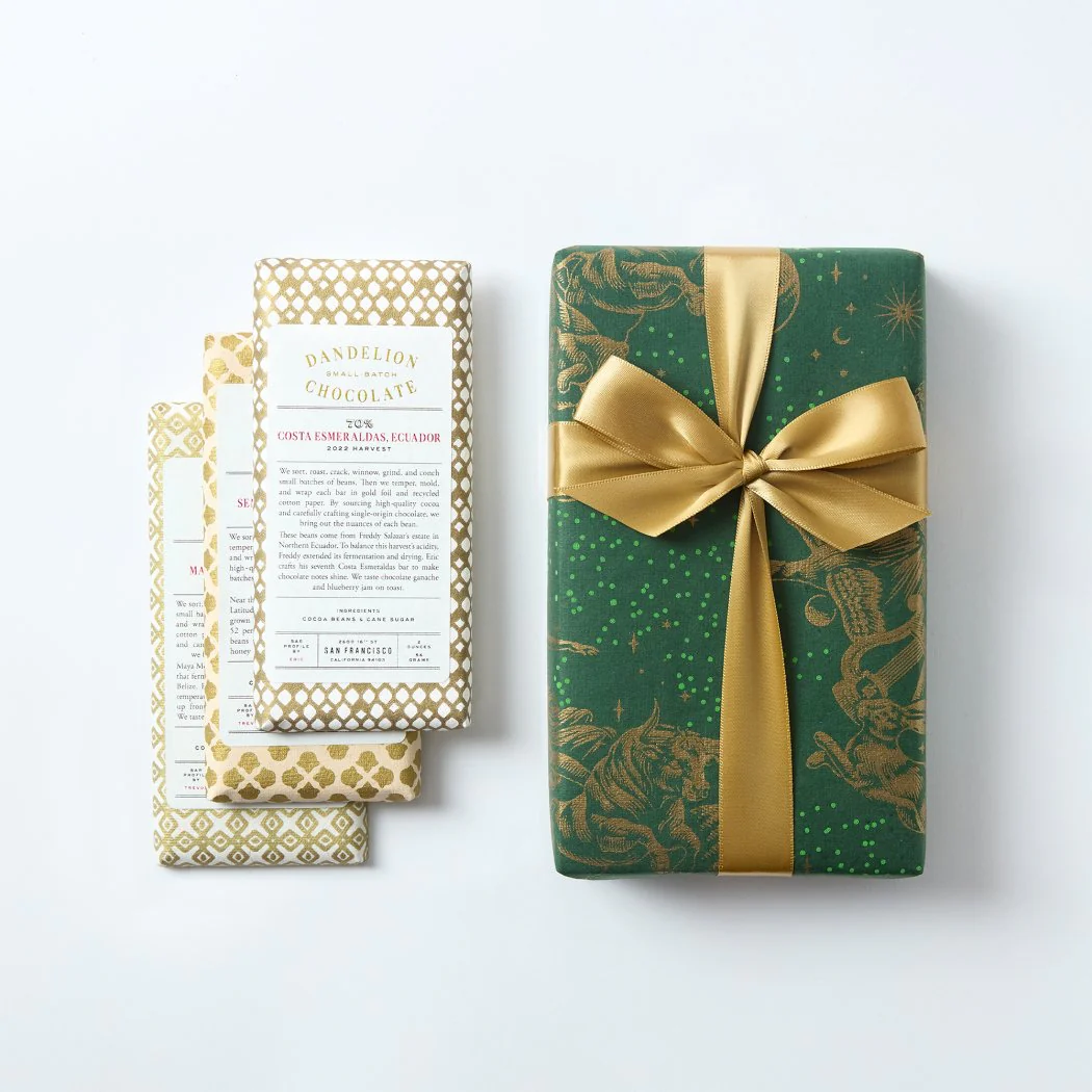 A curated set of three single-origin bars from Dandelion Chocolate, each revealing the distinct flavors and nuances of rare cacao from select regions.