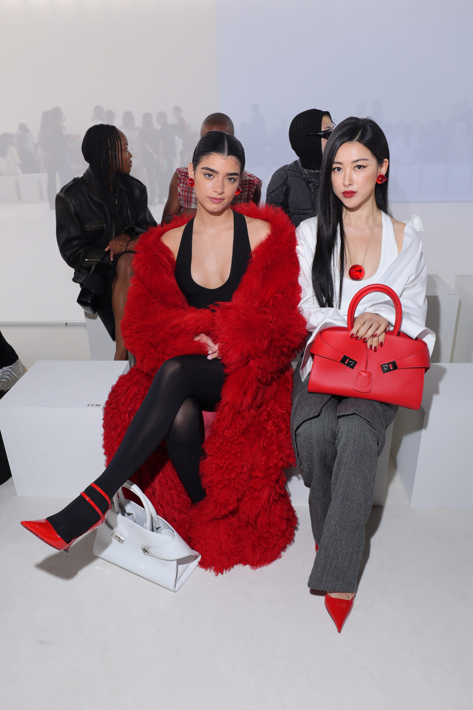 Dixie D'Amelio and Zhu Zhu attend the Salvatore Ferragamo Spring Summer 2024 fashion show on September 23, 2023 in Milan, Italy. (Photo by Jacopo M. Raule/Getty Images for Salvatore Ferragamo)