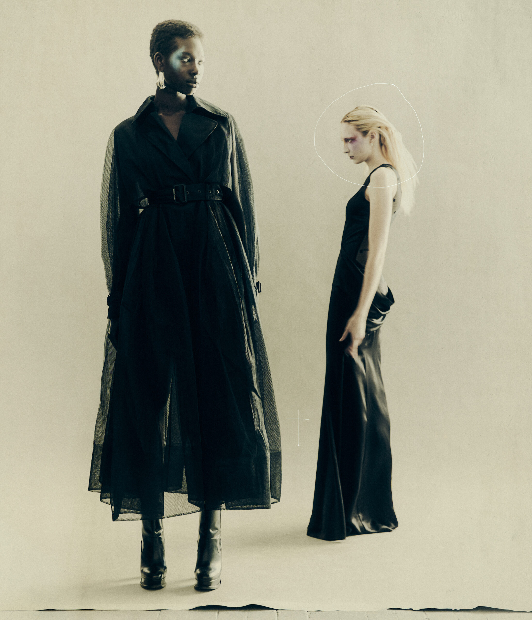 From Left: Awet wears all by ALEXANDER MCQUEEN, Eleanor wears dress by GIVENCHY, earrings by MARIA TASH, shoes by LOUIS VUITTON