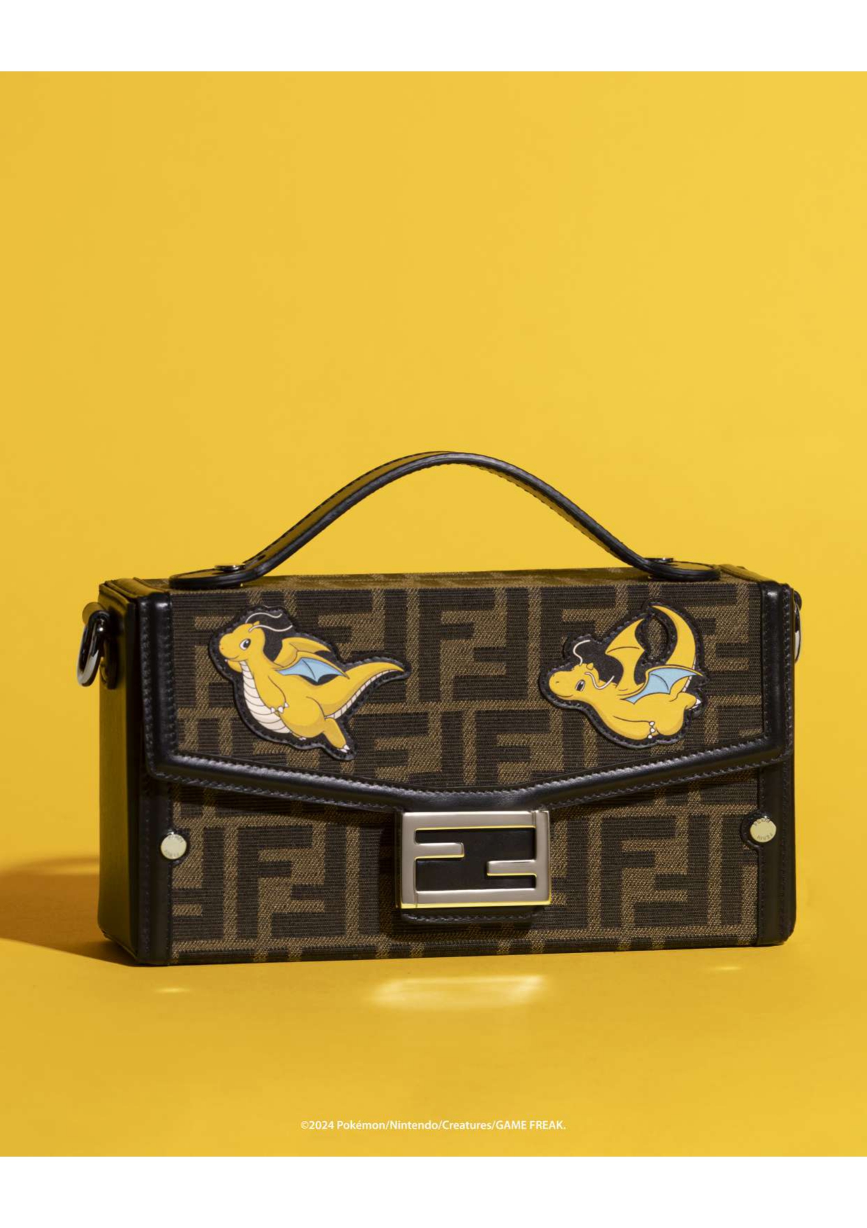 Fendi’s exceptional craftsmanship meets the vibrant world of Pokémon, showcasing a Dragon-type Pokémon playfully perched on the classic Fendi baguette bag, a symbol of fashion’s fun new frontier.