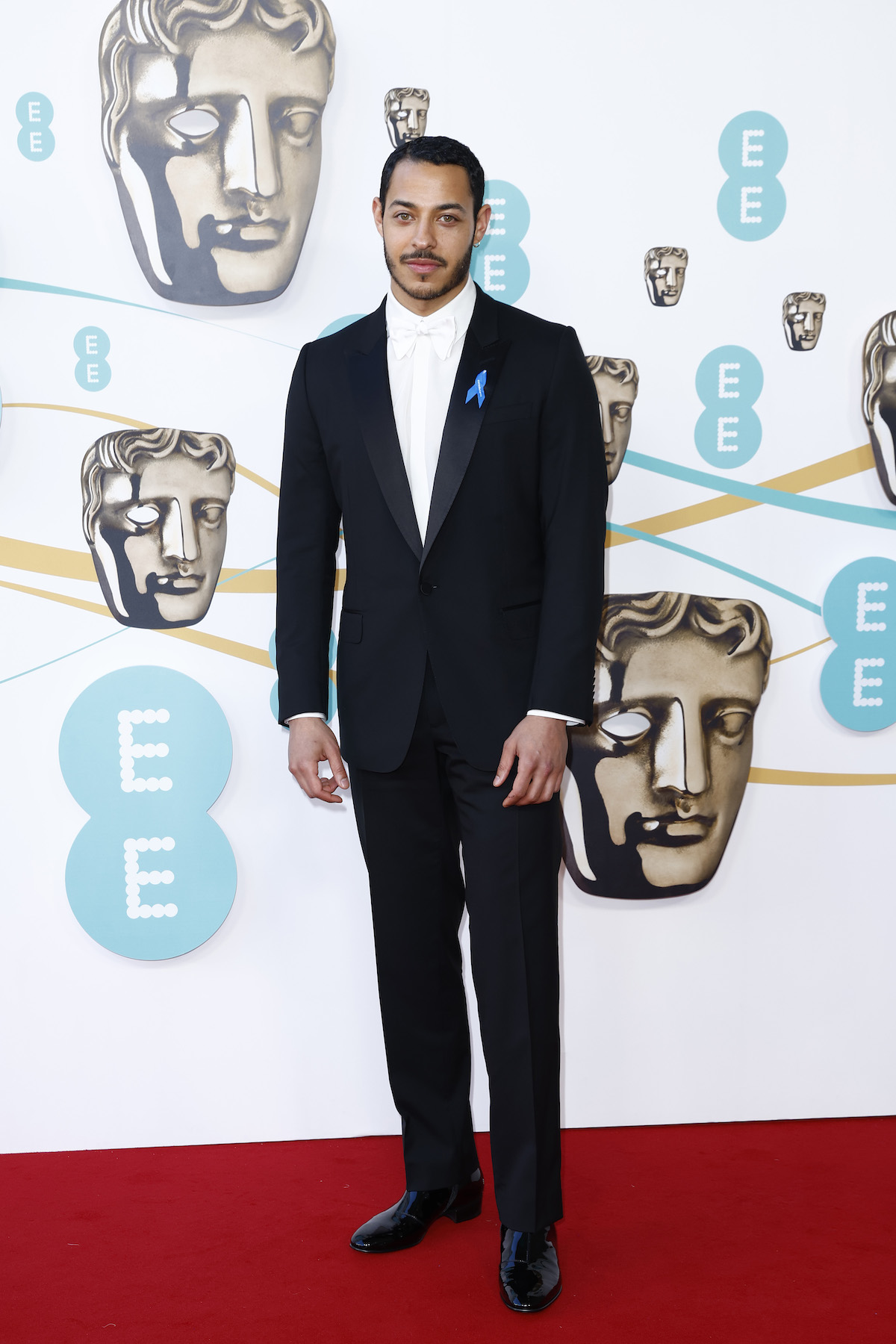 Daryl McCormack, nominated for EE Rising Star and Leading Actor in Good Luck To You, Leo Grande, wears a black tuxedo; image courtesy of Gucci. Daryl McCormack