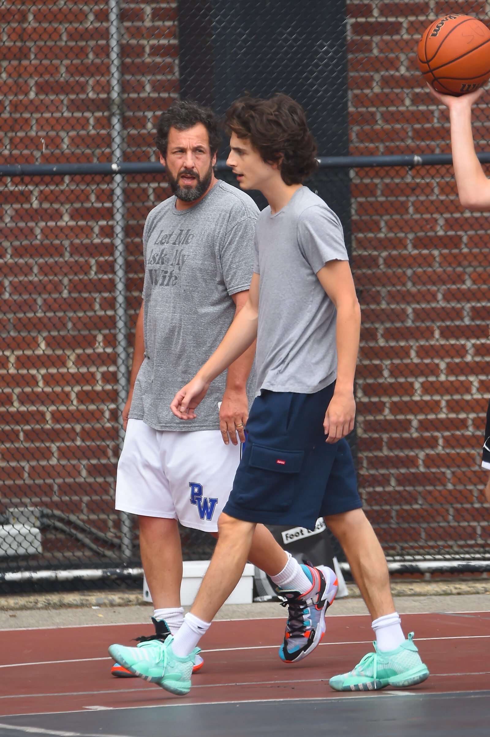 Timothee Chalamet and Adam Sandler are seen playing basketball in Soho on July 20, 2023 in New York City. (Photo by Raymond Hall/GC Images/Getty Images). Timothee Chalamet and Adam Sandler are seen playing basketball in Soho on July 20, 2023 in New York City. (Photo by Raymond Hall/GC Images)