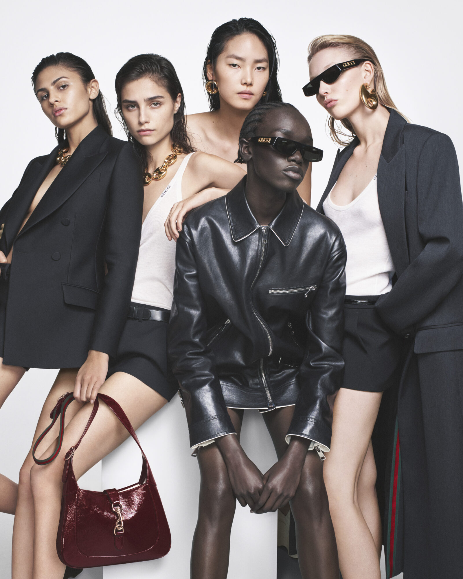 A Spectrum of Sophistication: Gucci Ancora enlivens the palette with crisp black and soft ivory, a testament to understated glamour.