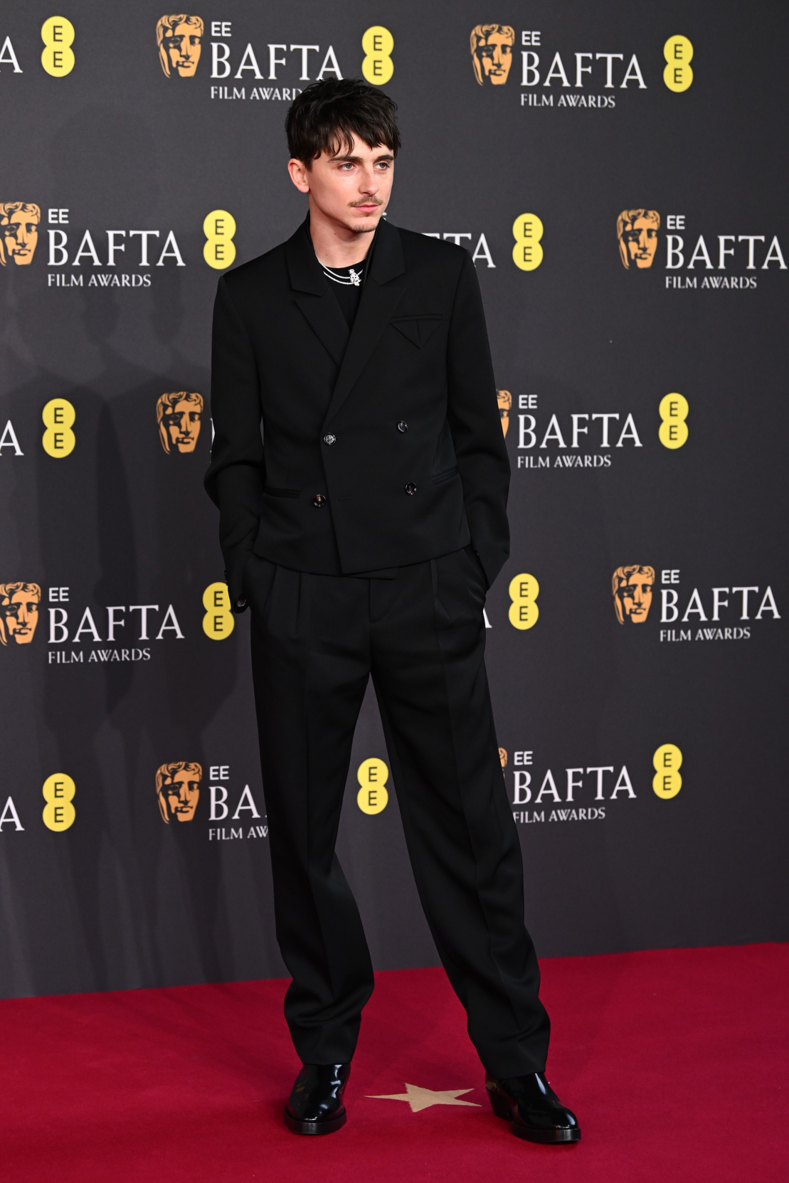 Timothée Chalamet stuns in a double-breasted suit paired with Dalton boots from Bottega Veneta at the 2025 EE BAFTA Film Awards in London on February 16, 2025. (Photo: Courtesy of Bottega Veneta) Timothée Chalamet stuns in a double-breasted suit paired with Dalton boots from Bottega Veneta at the EE BAFTA FILM AWARDS 2025 in London on February 16, 2025. (Photo: Courtesy of Bottega Veneta)