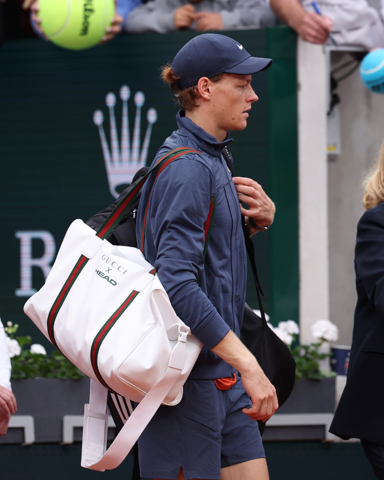 Jannik Sinner spotted with his custom GUCCI x HEAD duffle bag at Roland Garros. (Image: Antoine Couvercelle)