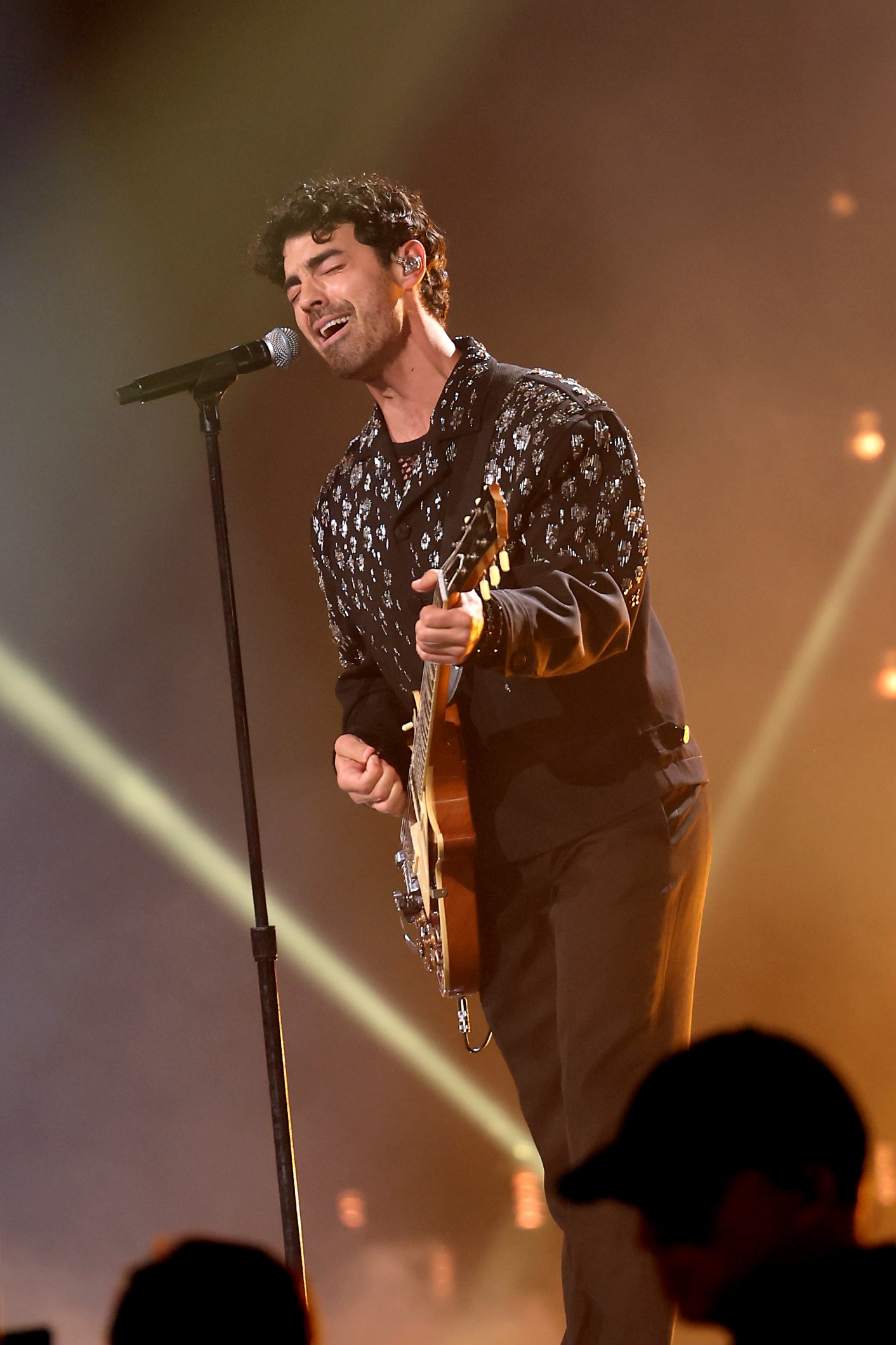 Joe Jonas in Versace merges rock-star energy with elegant design. (Photo: Courtesy of Versace)