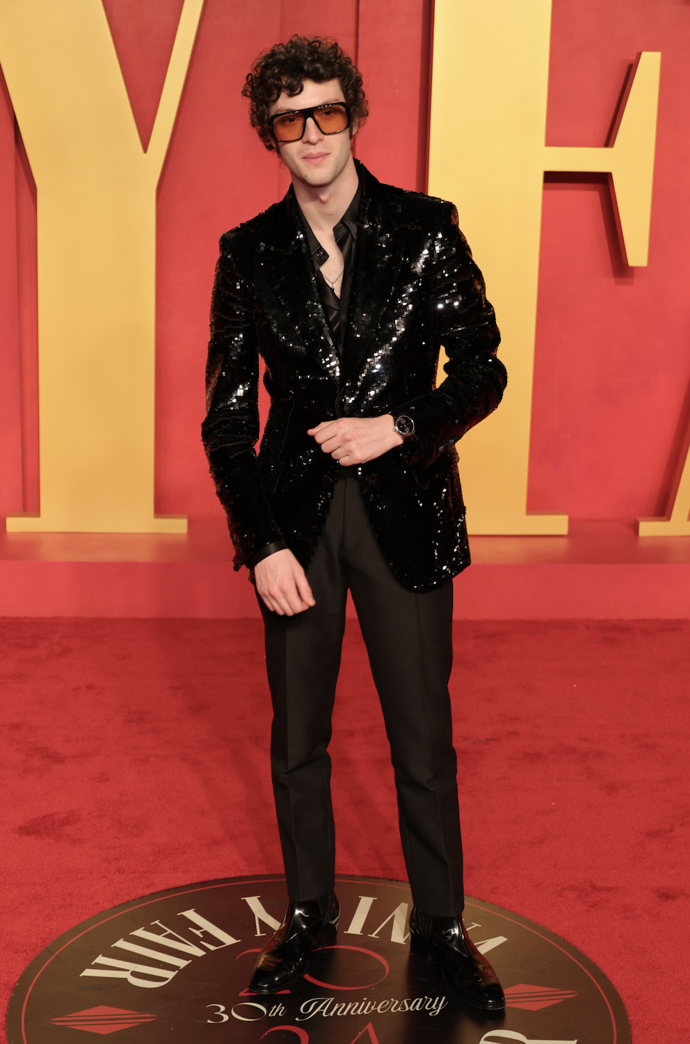 Dominic Sessa redefines sophistication in a Tom Ford embroidered jacket at the Vanity Fair Oscar Party. (Photo Credit: Courtesy of Getty/Tom Ford)