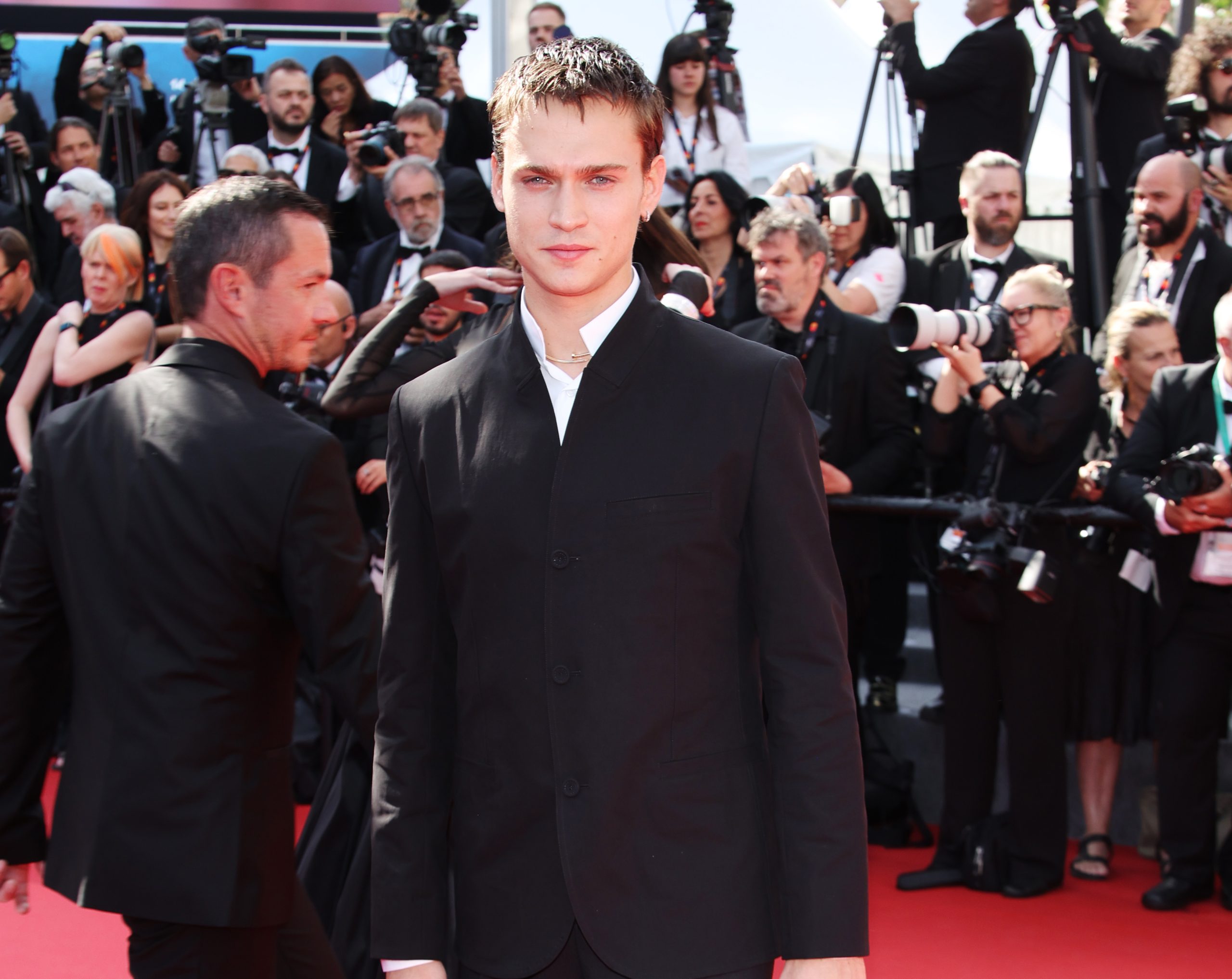 Oliver Stone, Saul Nanni, and Souheila Yacoub Shine in Dior at the 77th Annual Cannes Film Festival