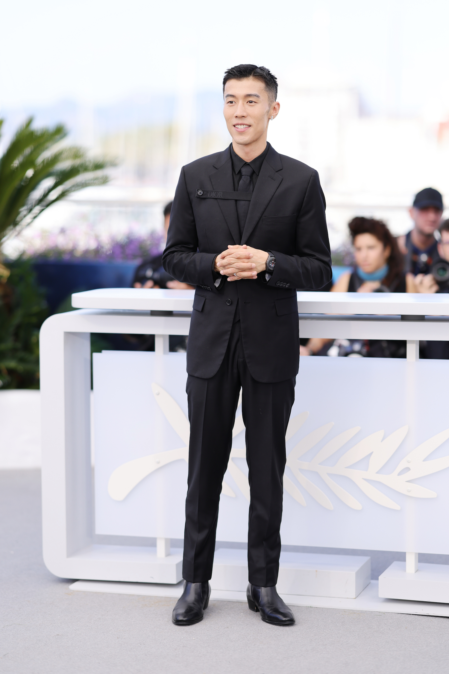 You Zhou attends the "Caught By The Tides" Photocall at the 77th annual Cannes Film Festival at Palais des Festivals on May 19, 2024 in Cannes, France. (Photo by Andreas Rentz/Getty Images)
