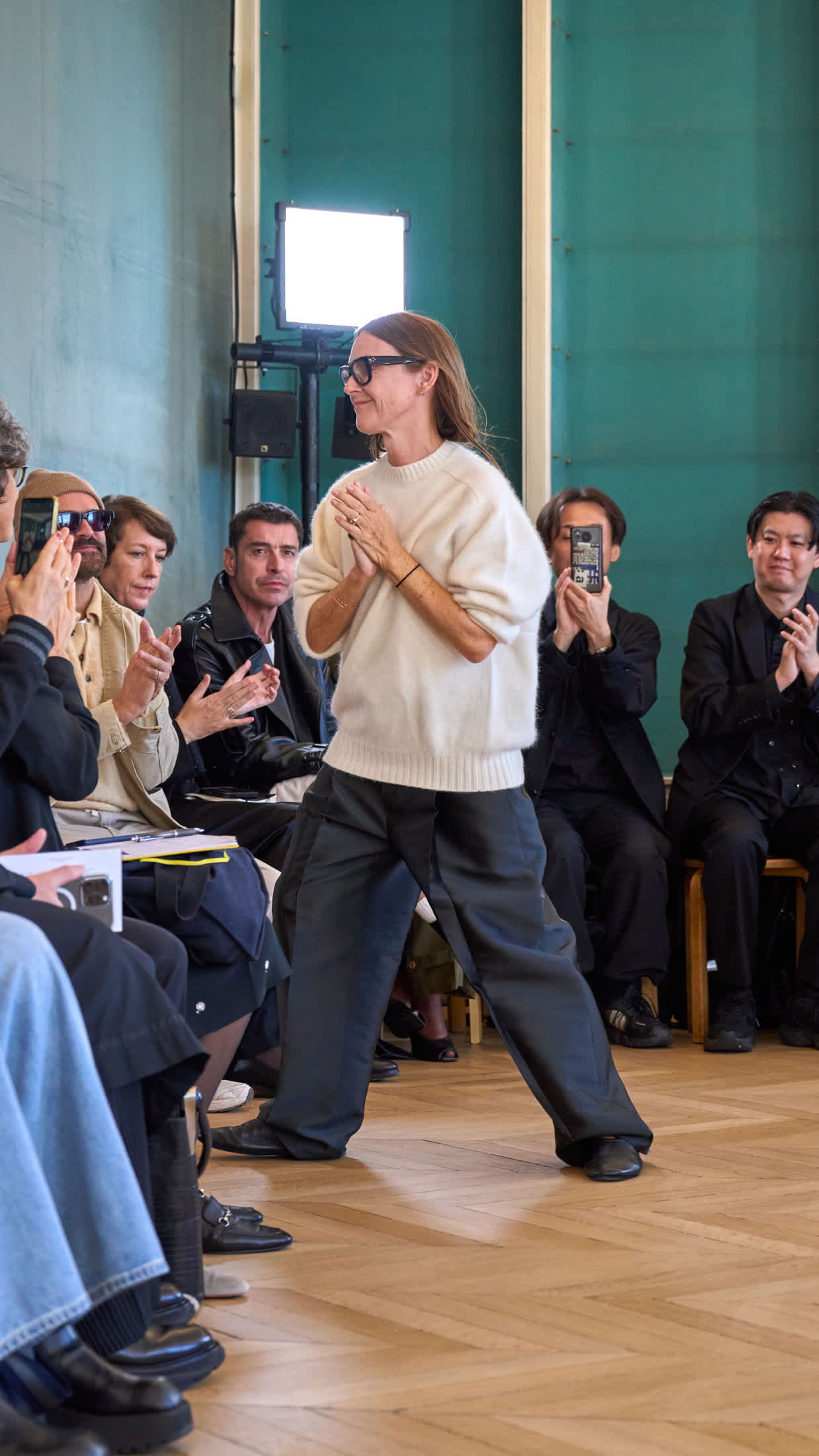 Louise Trotter takes a bow at the close of the Carven Spring-Summer 2025 runway show.