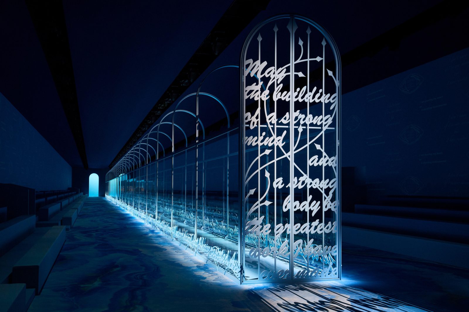 SAGG Napoli's installation, "Con il cuore in una mano e l'arco nell'altra" adorning the catwalk of the DIOR Women’s Spring-Summer 2025 show in Paris.