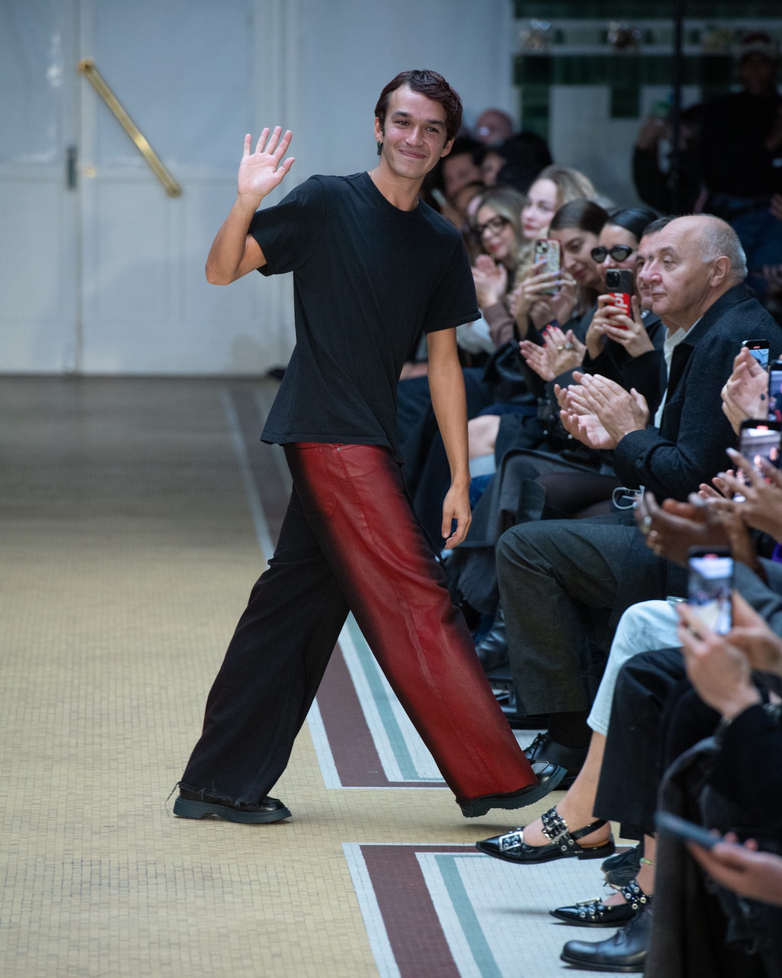 Alphonse Maitrepierre takes a bow at the close of the Maitrepierre Spring-Summer 2025 runway show in Paris.