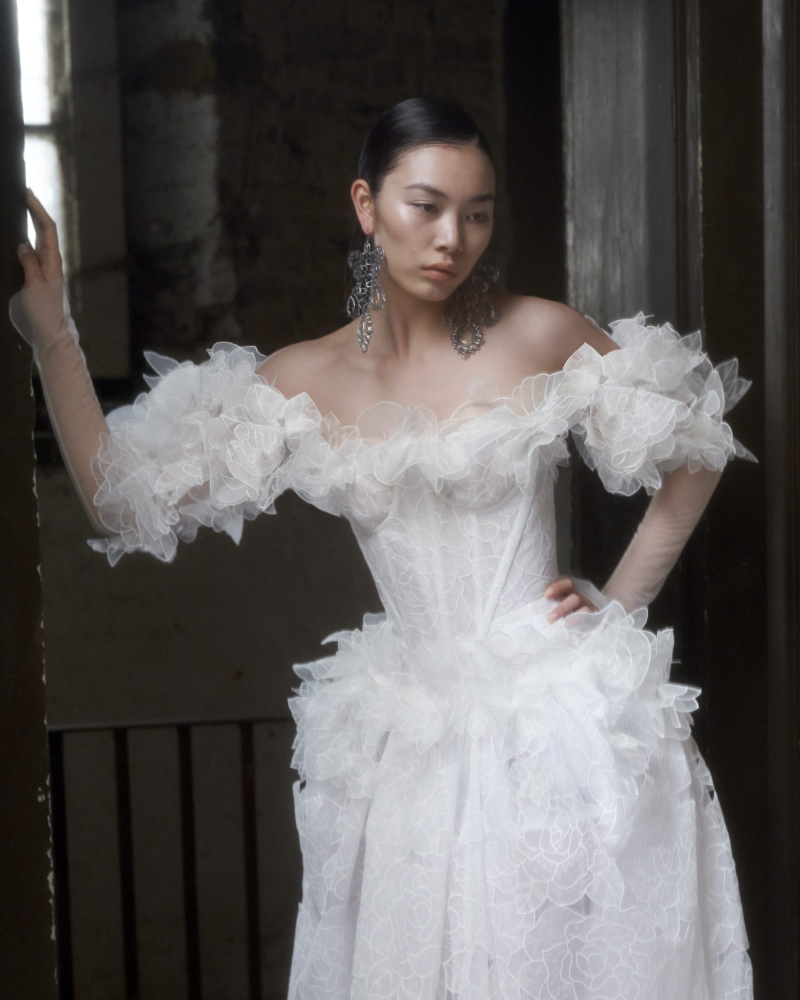 Olivia: Where organza blooms and sleeves speak volumes