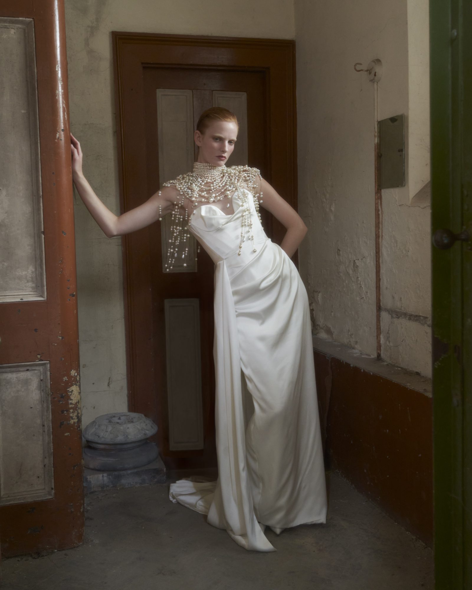 Ava: A modern twist on bridal couture with strapless elegance and pearl accents