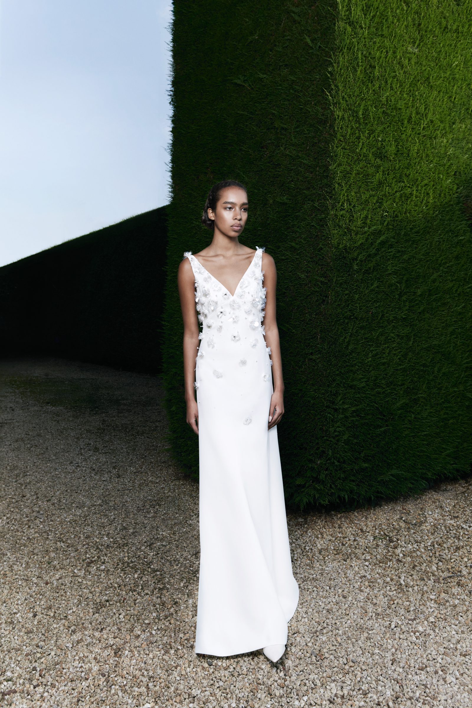 Pailette Floral Gardens Column Gown: Shimmering floral paillettes adorn this sleek column silhouette, creating a garden of light.