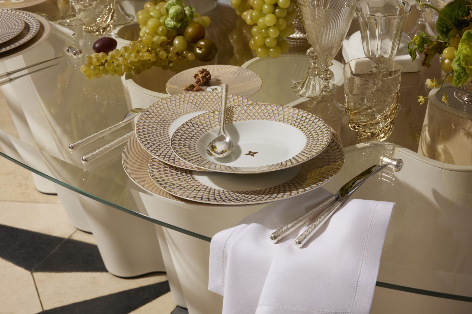 A detail of the Louis Vuitton Splendor Service, complete with cutlery and Murano blown glass pieces to make an exceptional dining impression.