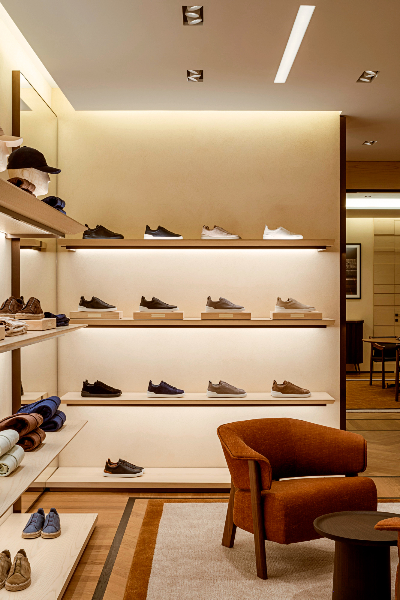 Interior view of the Triple Stitch sneaker display, featuring ZEGNA's signature leather armchair (Image: ZEGNA)