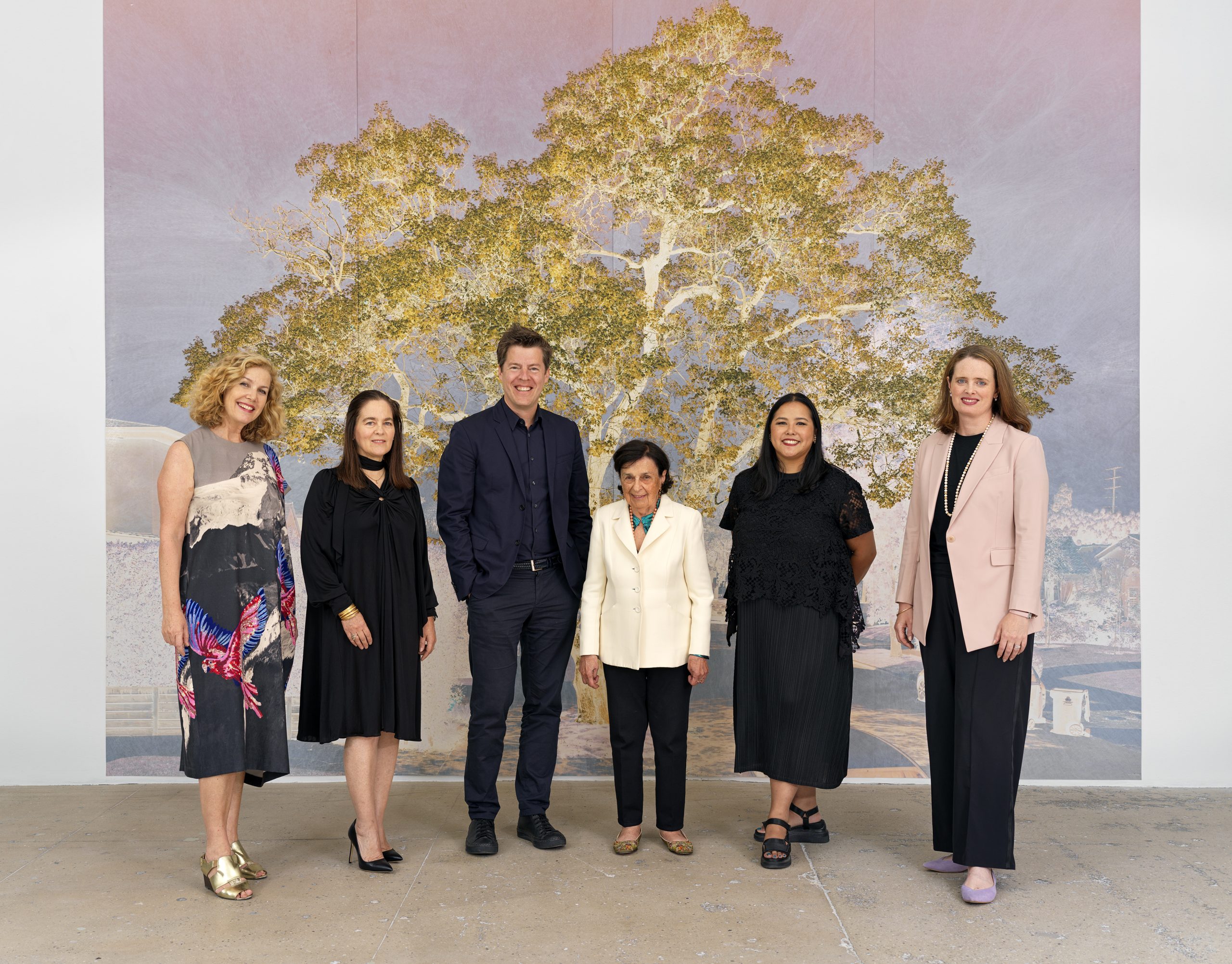 Marian Goodman Gallery Partnership (from left): Rose Lord, Leslie Nolen, Philipp Kaiser, Marian Goodman, Junette Teng, and Emily-Jane Kirwan. Background: Tacita Dean, Purgatory (4th Cornice), 2021. Photo: Alex Yudzon