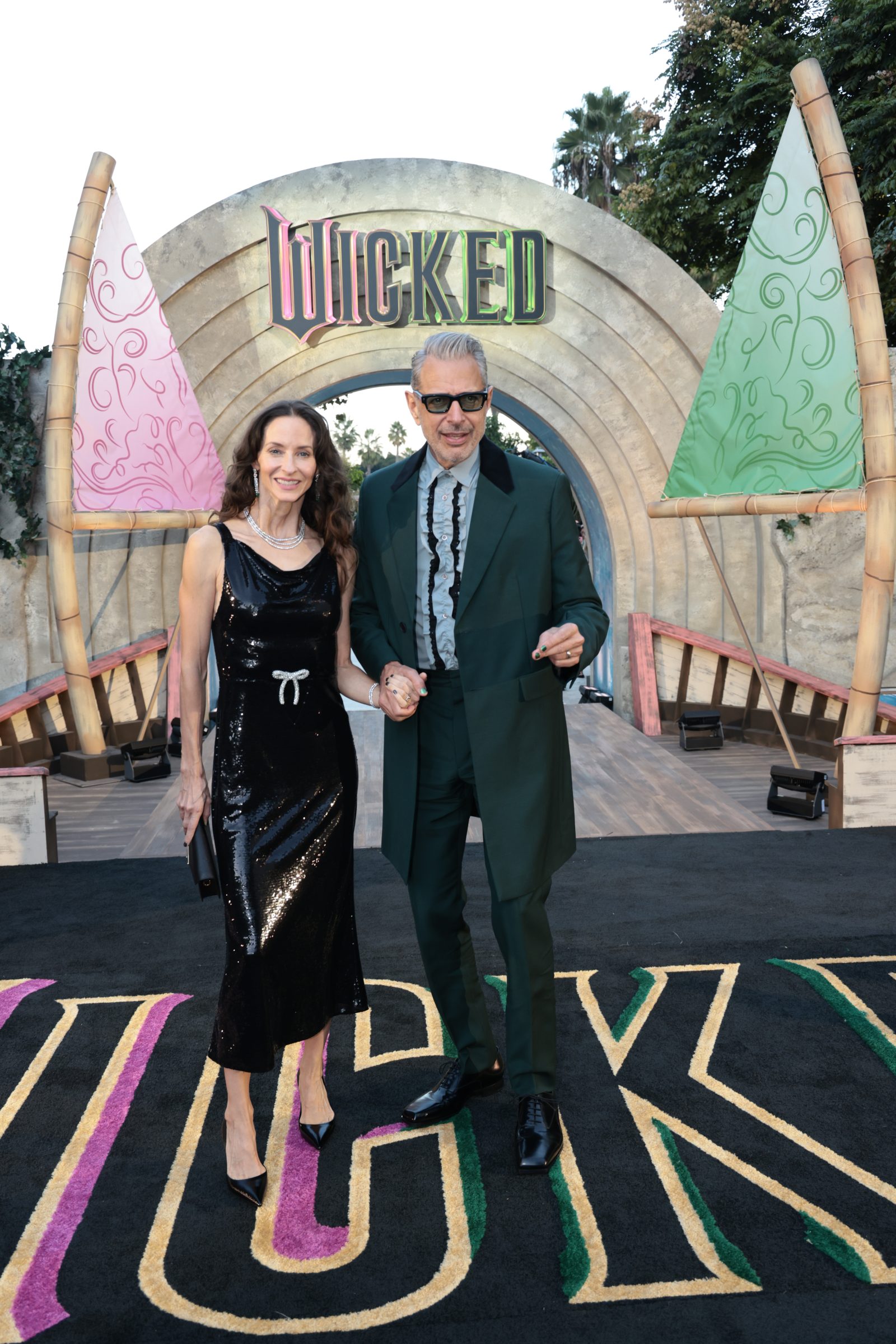 Jeff Goldblum and Emilie Goldblum arrive at the Los Angeles premiere of 'Wicked' wearing coordinated Prada ensembles. (Photo by Rob Latour/Shutterstock)