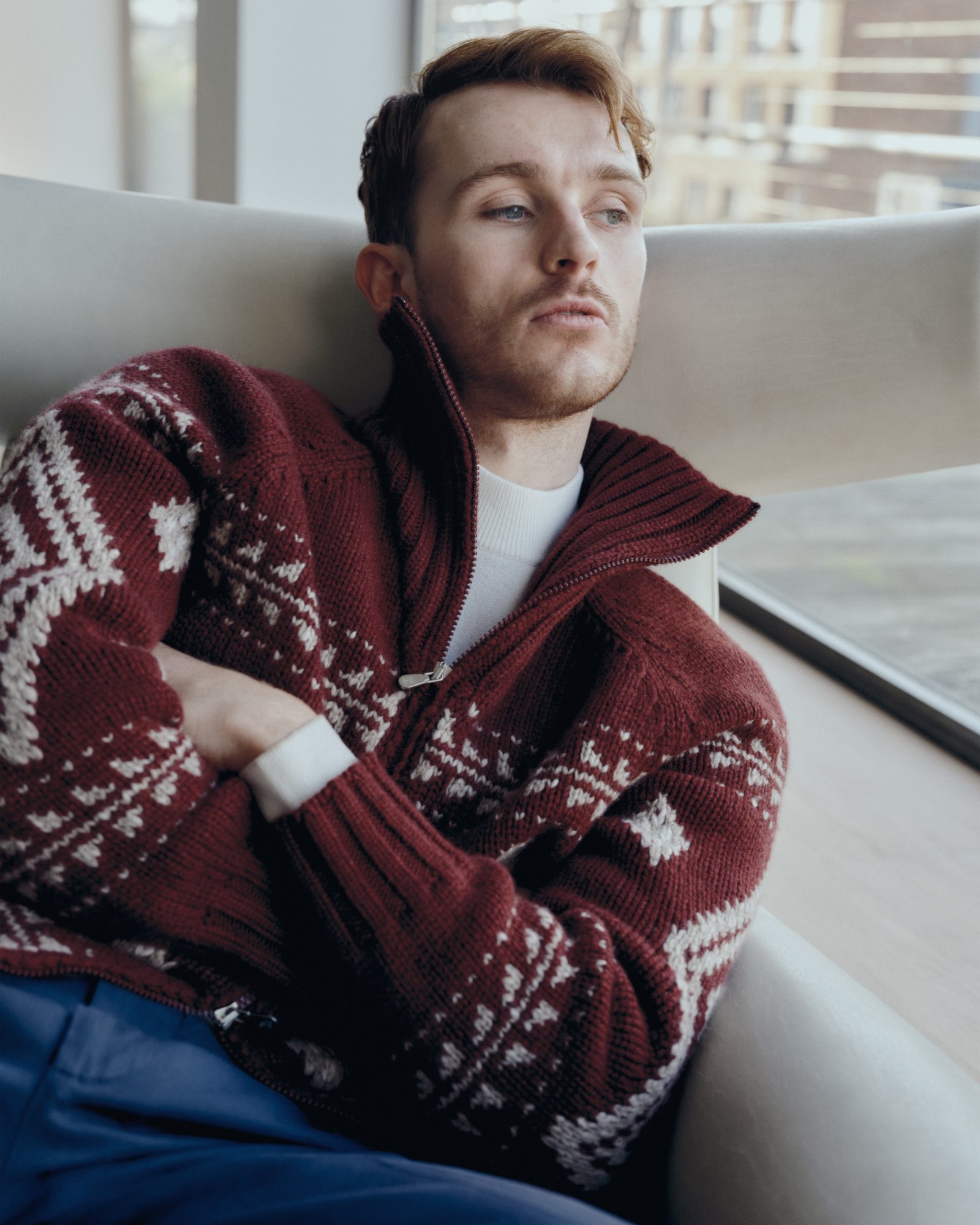 The campaign showcases the collection’s festive direction with a burgundy Fair Isle zip-up knit, signaling the brand’s venture into bolder seasonal patterns, while staying true to its commitment to luxury comfort.