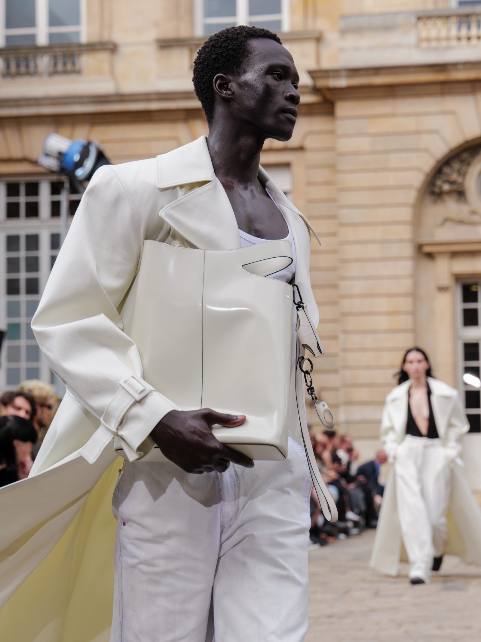 Unveiling fluidity: A sneak peek from Louis Gabriel Nouchi's ECCO.Kollektive collection at the LGN SS25 runway show in Paris, featuring rich tones of deep black, rouge noir, and pearlescent hues.