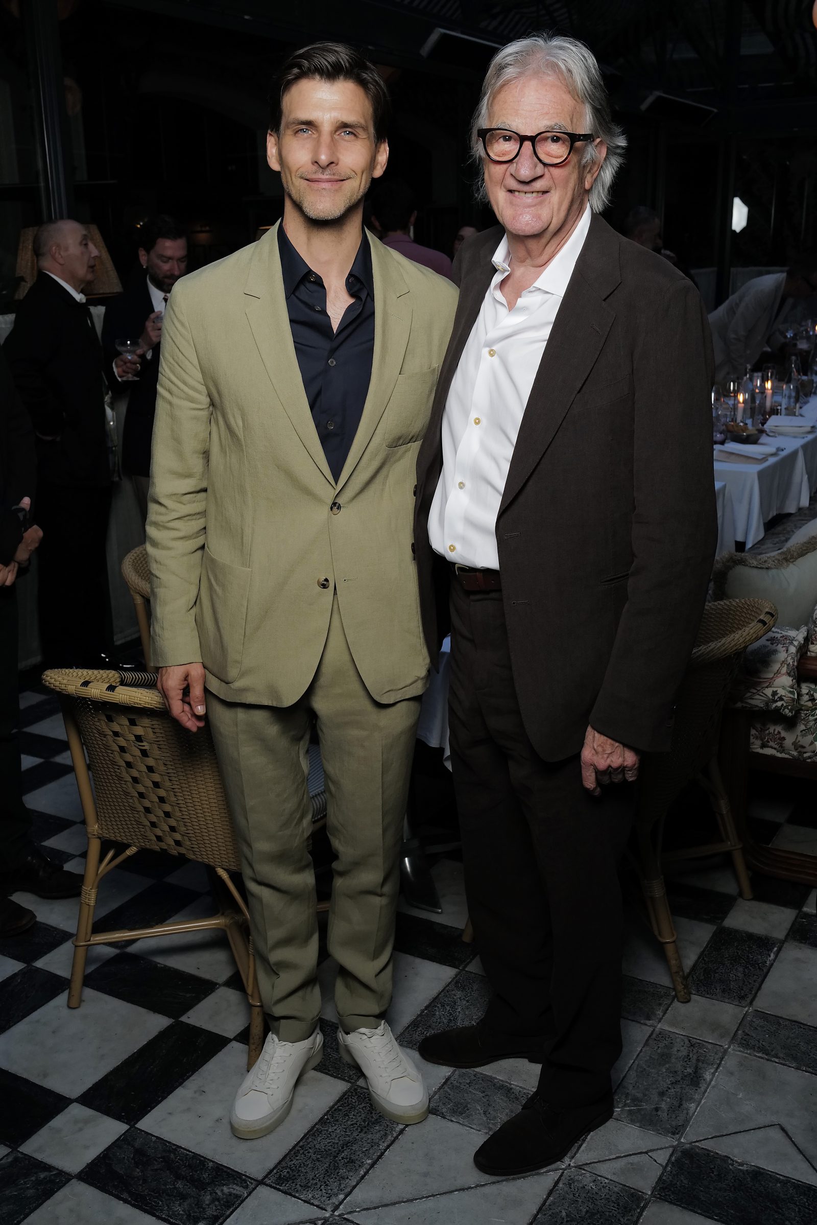 Johannes Huebl and Sir Paul Smith attend a dinner hosted by Paul Smith and Soho House to celebrate Paris Fashion Week at Soho House Paris on June 19, 2024 in Paris, France. (Photo by Darren Gerrish/Getty Images for Paul Smith)