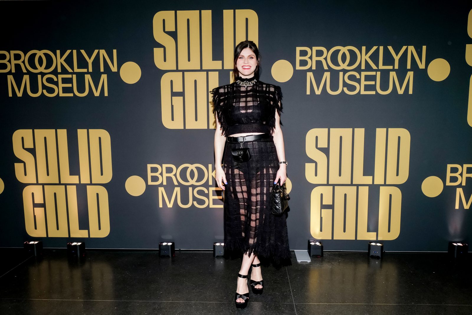 Alexandra Daddario arrives at Brooklyn Museum’s Solid Gold exhibition opening wearing an ensemble from the Dior Cruise 2025 collection (Photo by BFA)