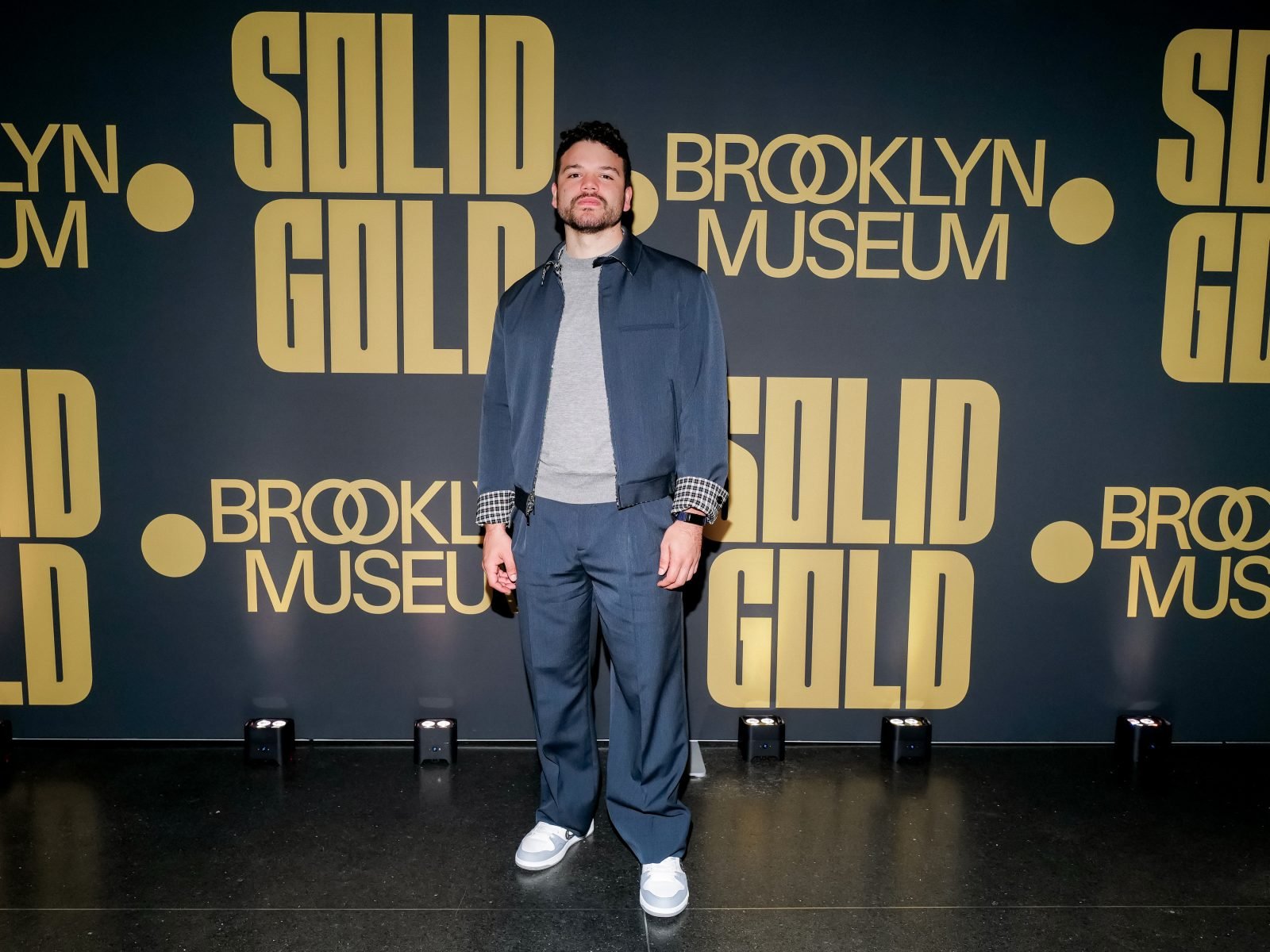 Josh Andres Rivera arrives at the Brooklyn Museum’s Solid Gold exhibition opening wearing an ensemble from the Dior Men Spring 2025 collection (Photo by BFA)