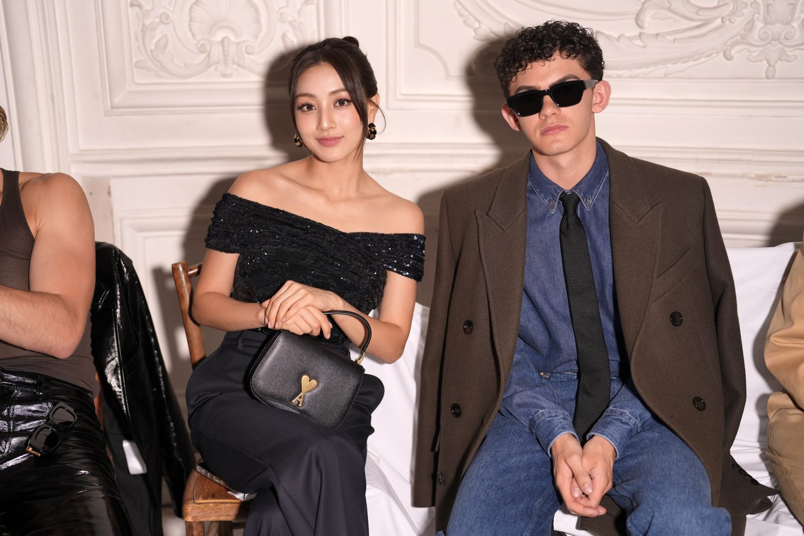 Jihyo and Joe Locke attend the AMI Spring Summer 2025 fashion show in Paris.