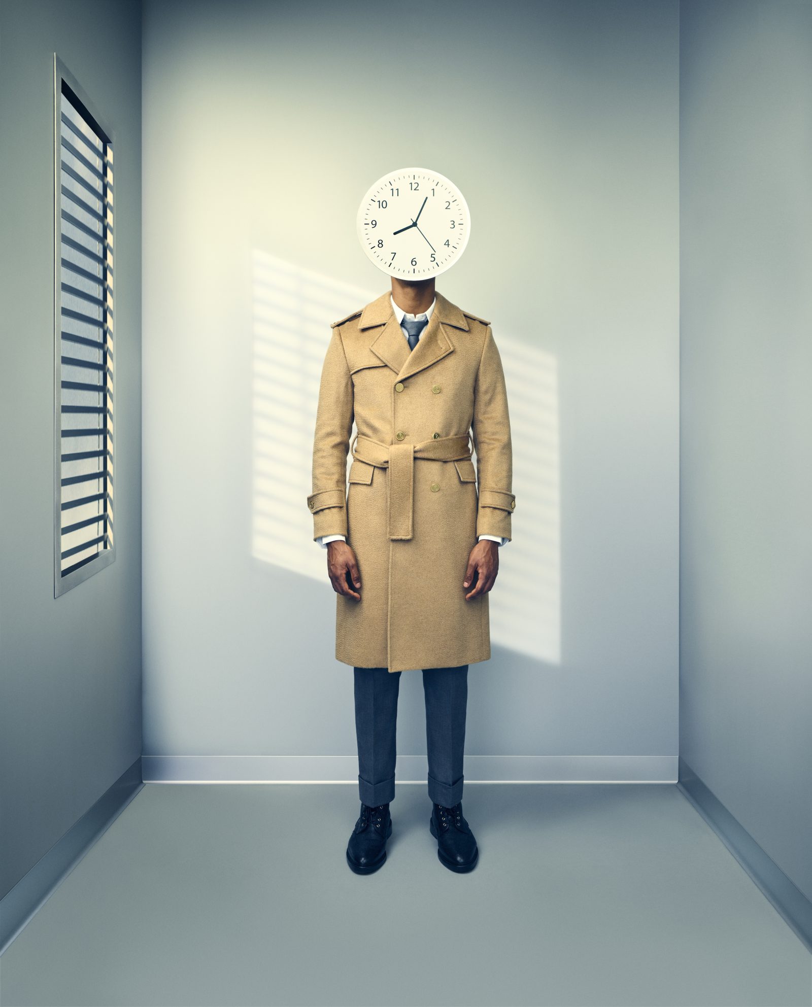 The Classic Camel Hair Trench Coat stands timeless, its clock-face design blending surrealism with refined tailoring. (Image: Courtesy of Thom Browne)