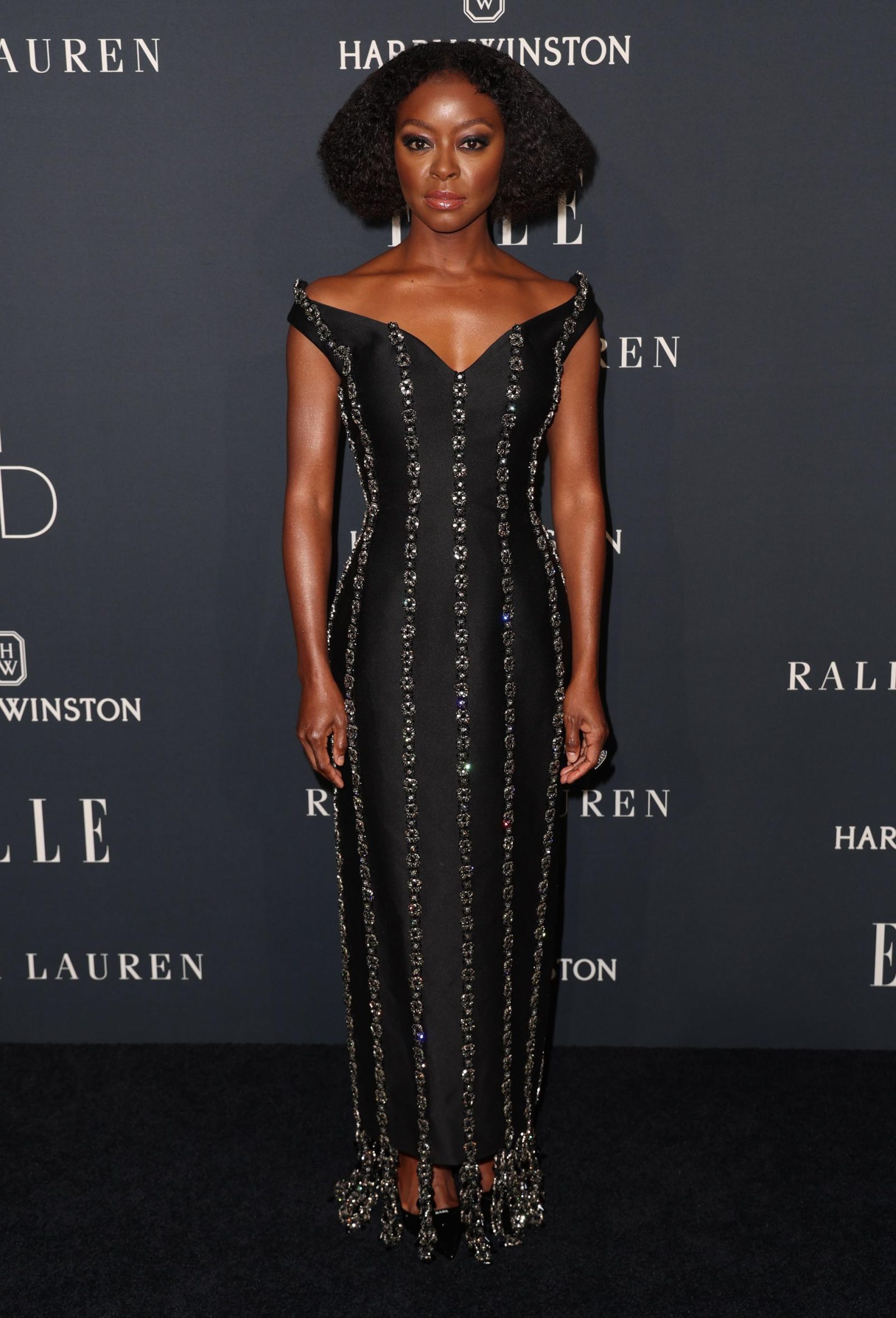 Danielle Deadwyler commands attention in a crystal-embellished black gown with dramatic off-shoulder neckline at ELLE Women in Hollywood. (Photo: Courtesy of Prada)